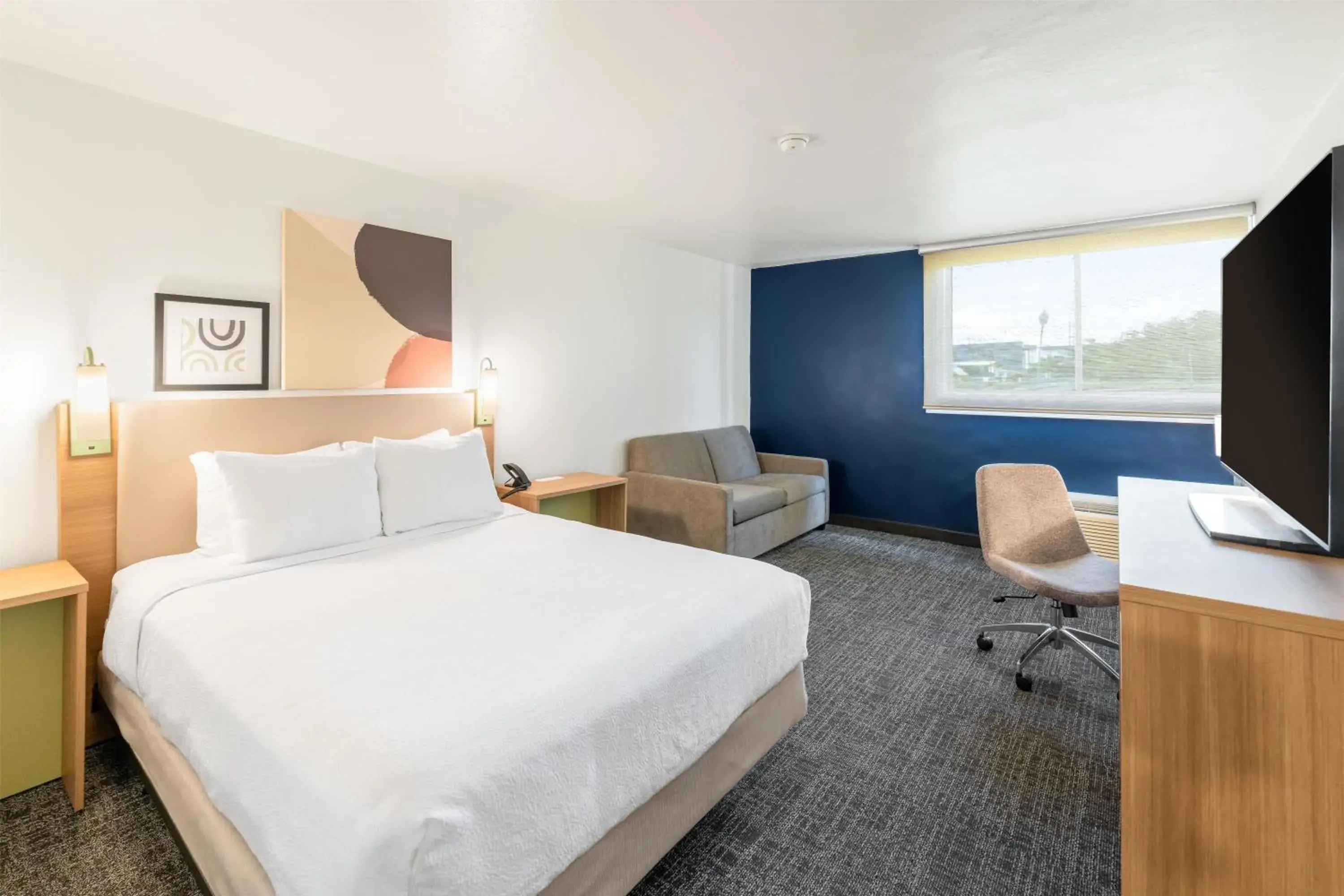 Living room, Bed in Spark by Hilton Ponce Living room, Bed in Spark by Hilton Ponce