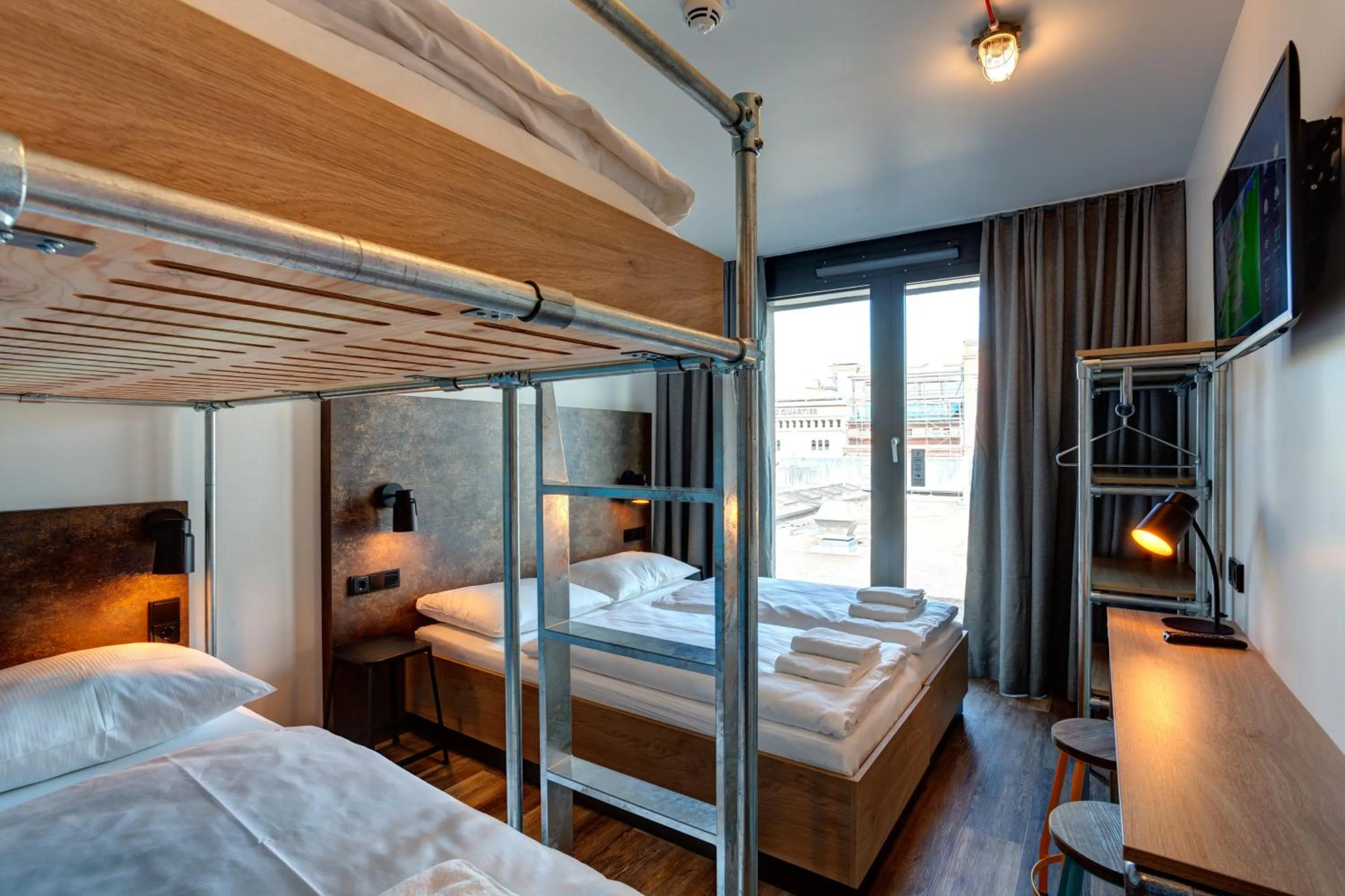 Photo of the whole room, Bed in MEININGER Hotel Berlin Tiergarten