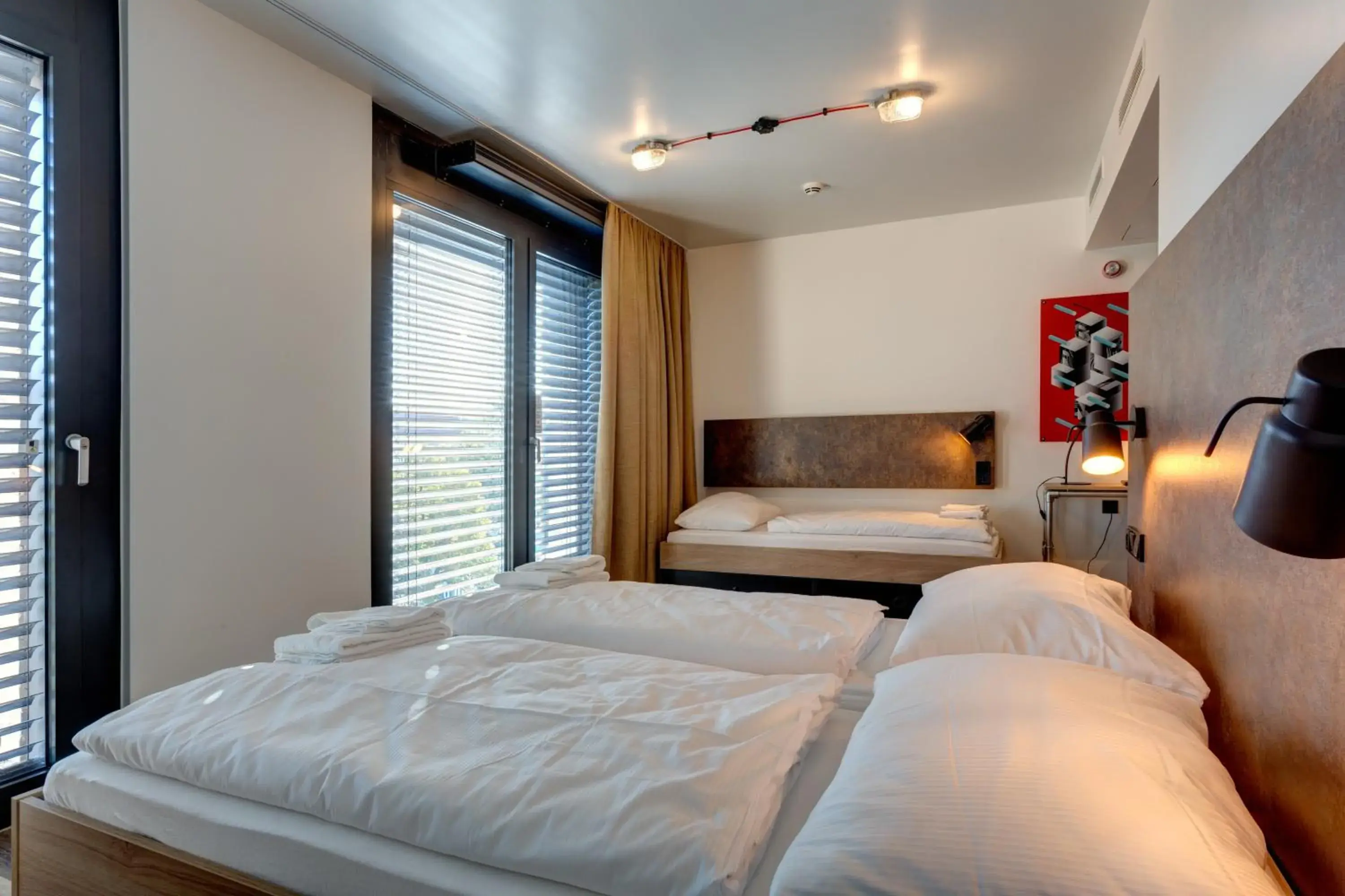 Triple Room in MEININGER Hotel Berlin Tiergarten Triple Room in MEININGER Hotel Berlin Tiergarten