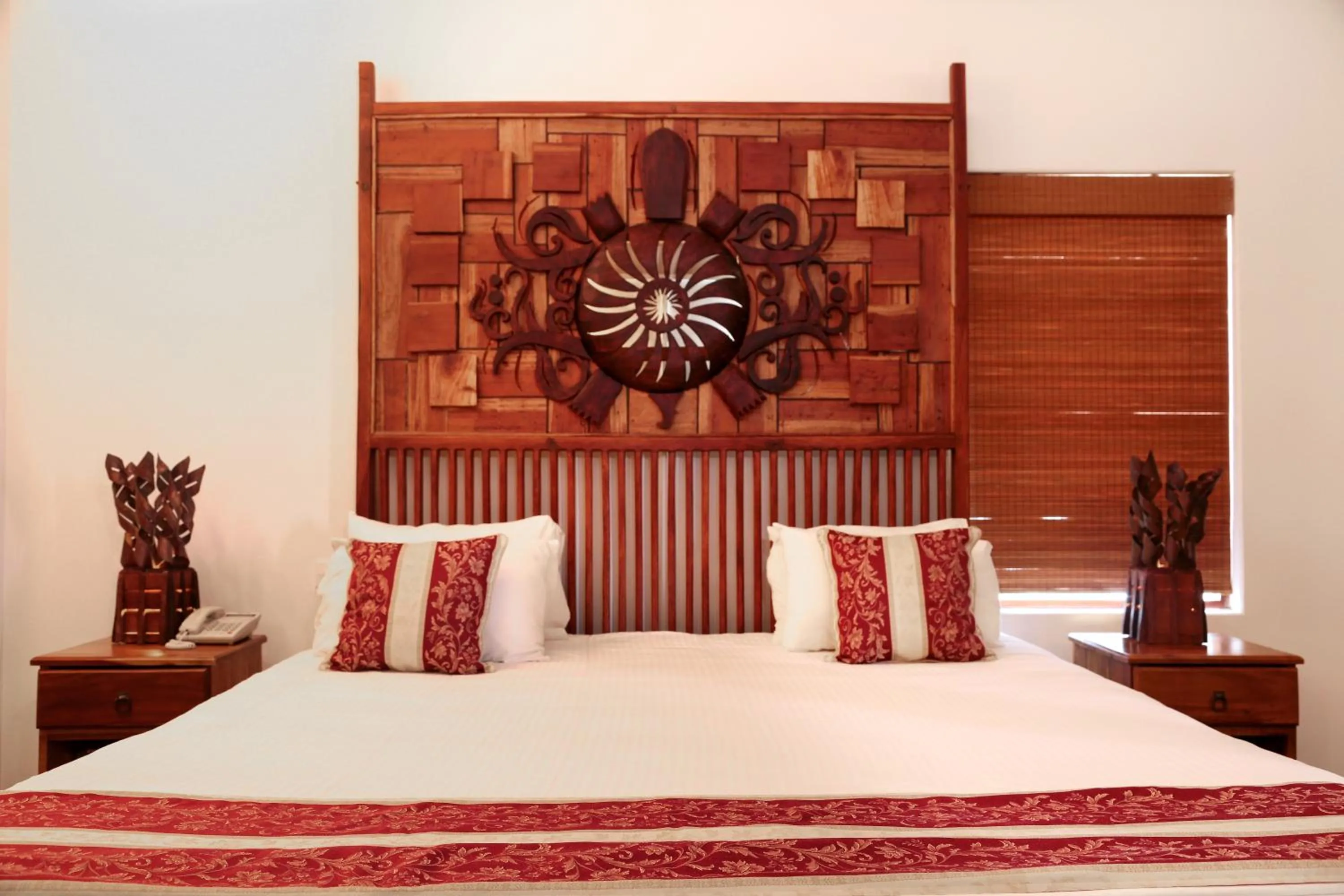Bed in Turtle Bay Boutique Hotel