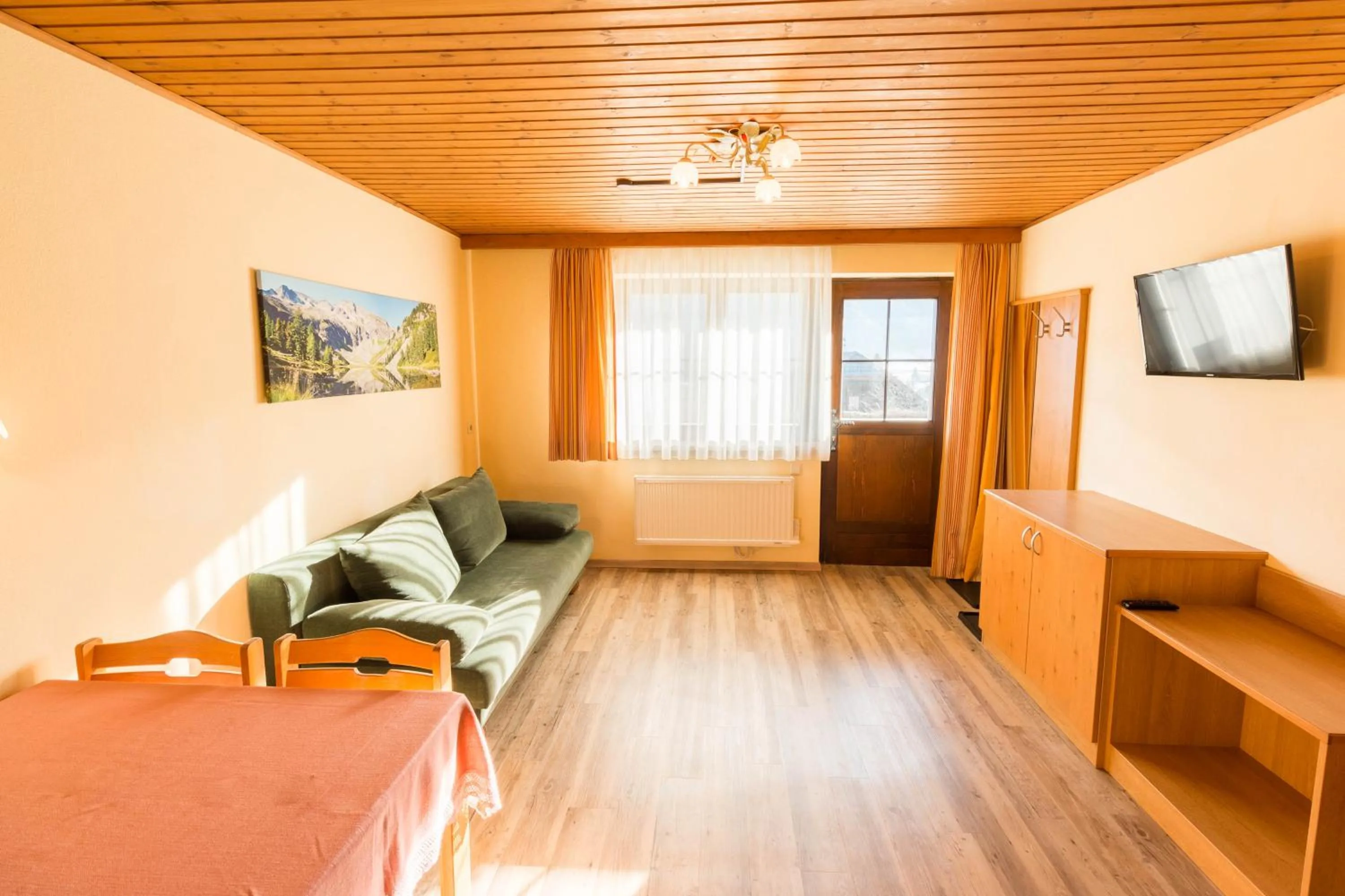 Seating area, Bed in Hotel Weissenstein