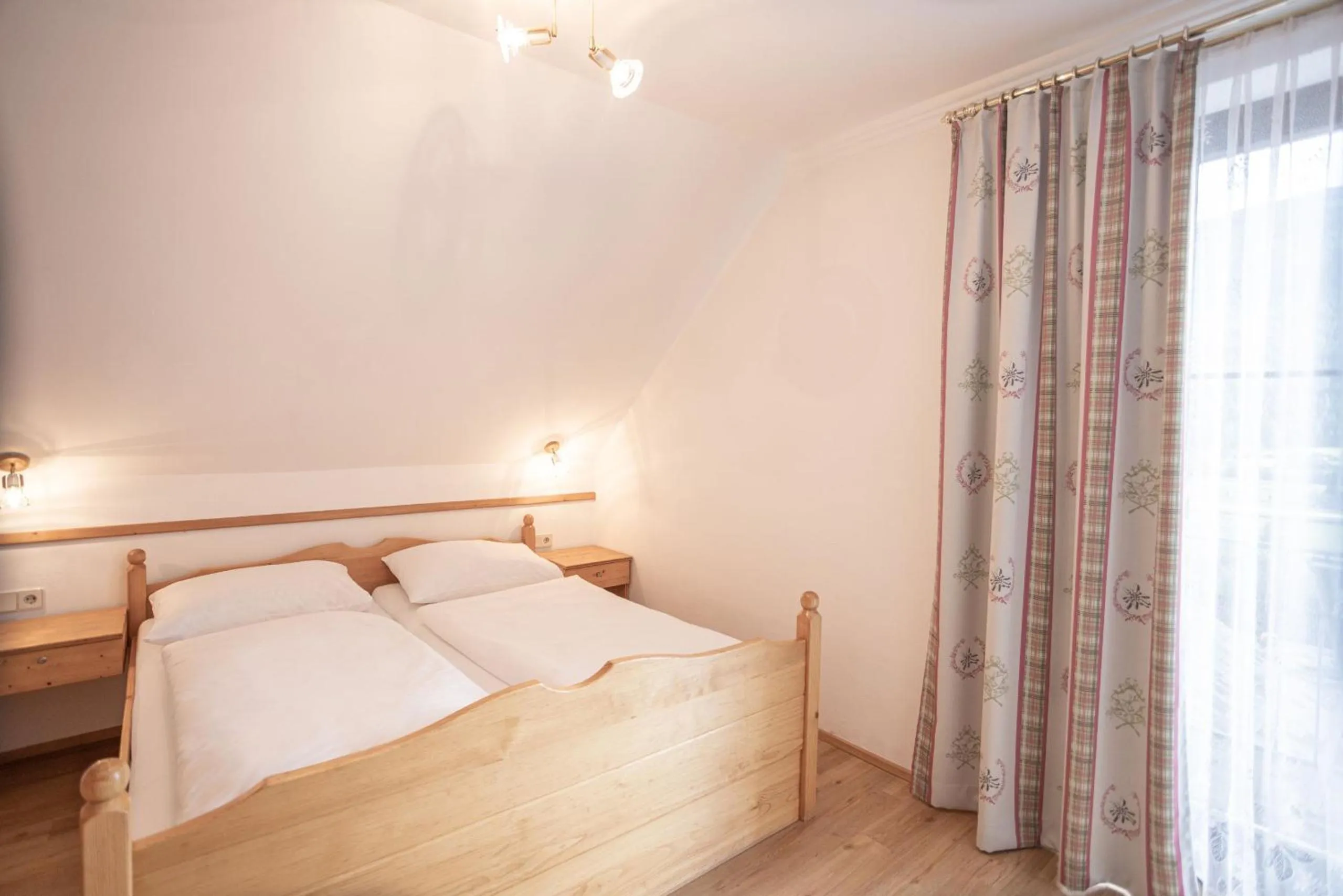 Photo of the whole room, Bed in Hotel Weissenstein