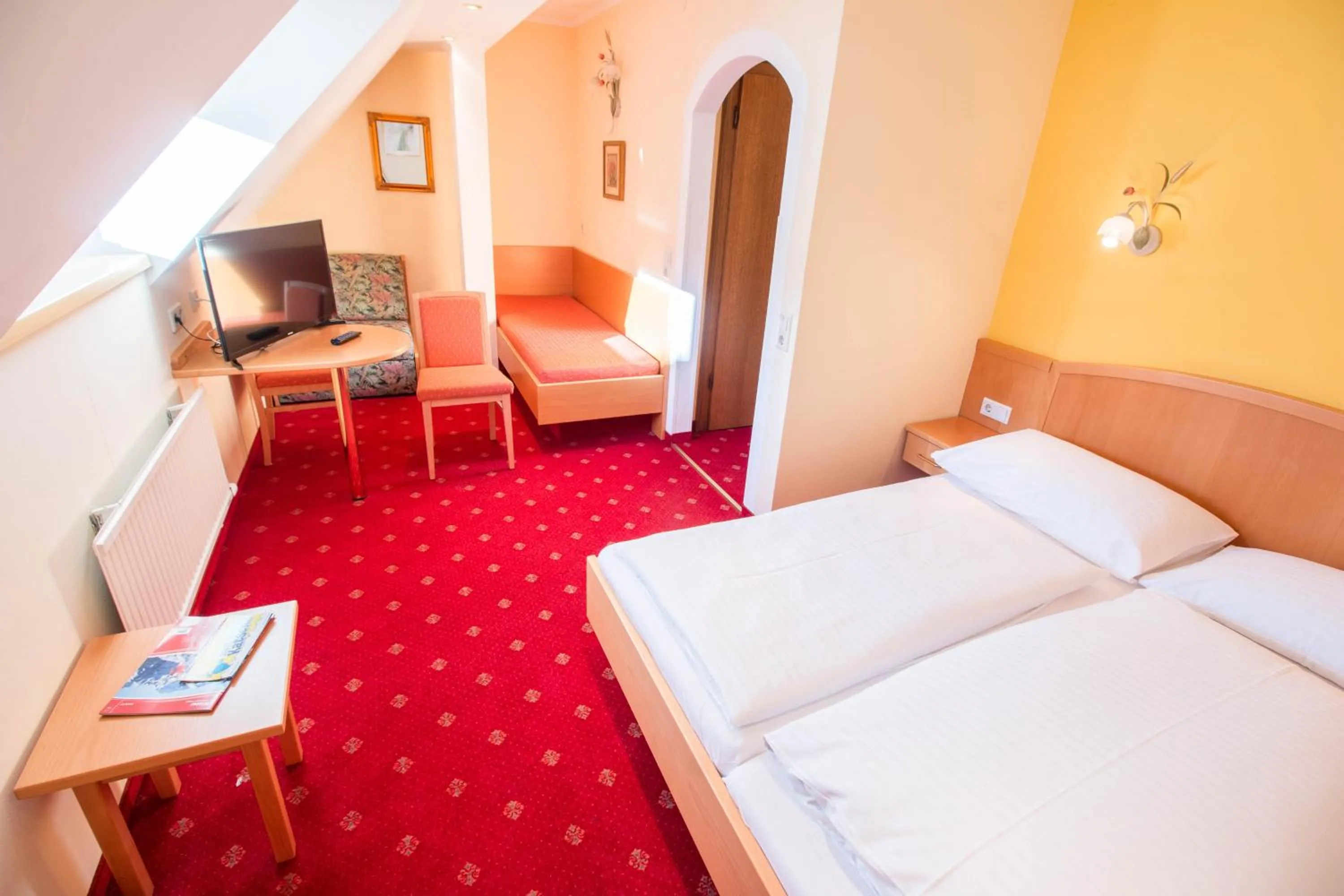 Photo of the whole room, Bed in Hotel Weissenstein