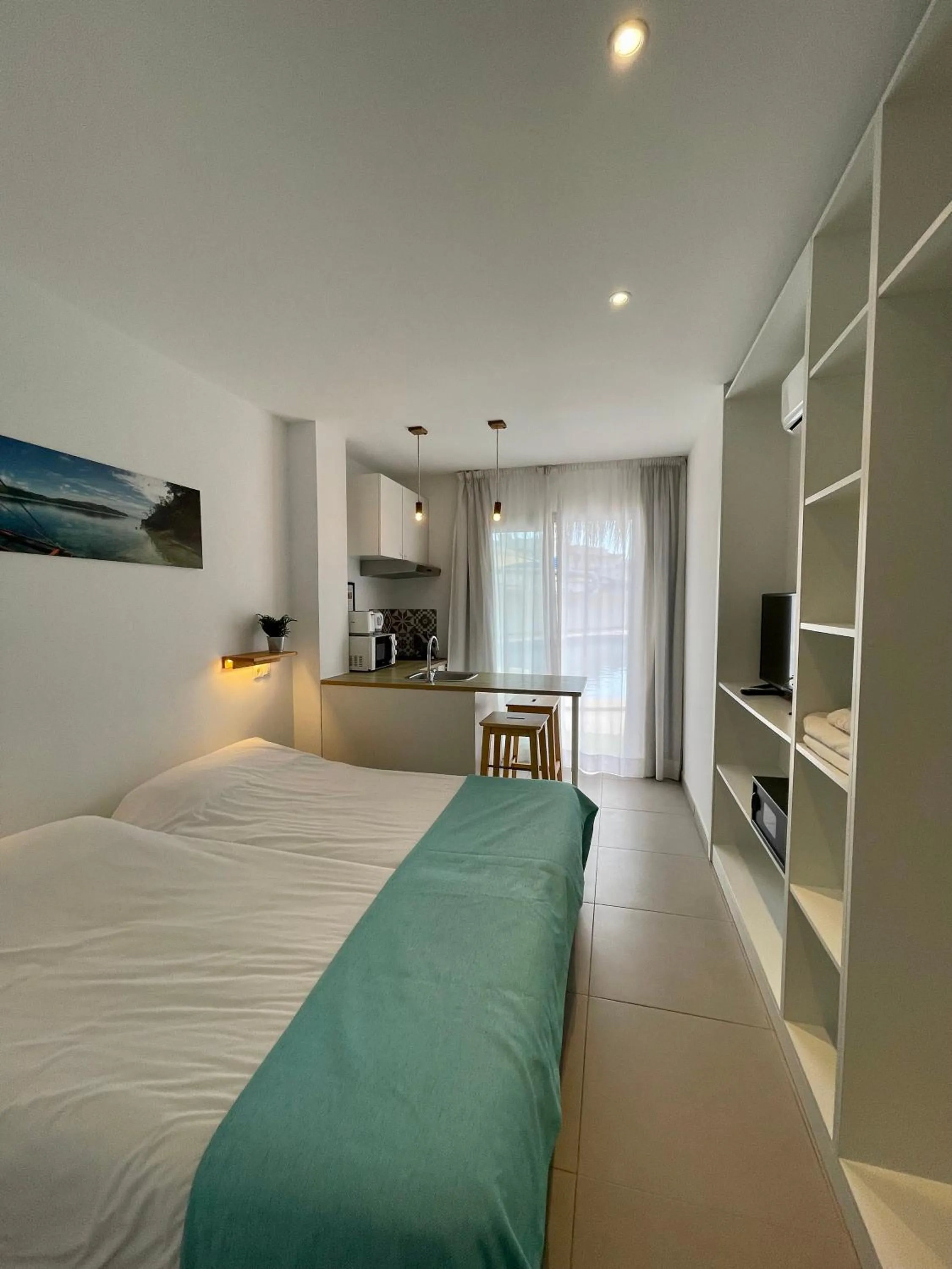 Bed in Apartaments La Perla Negra