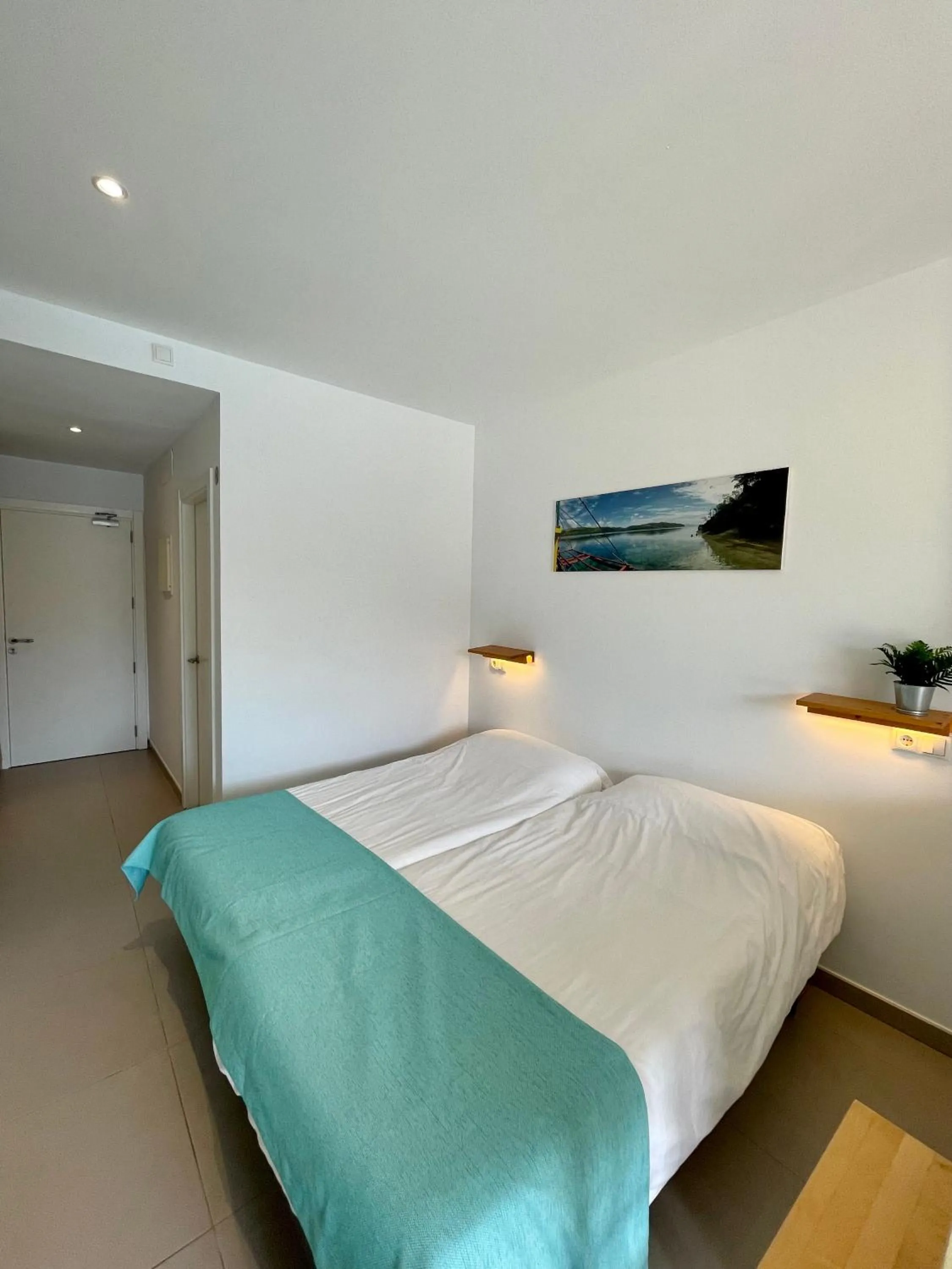 Bed in Apartaments La Perla Negra