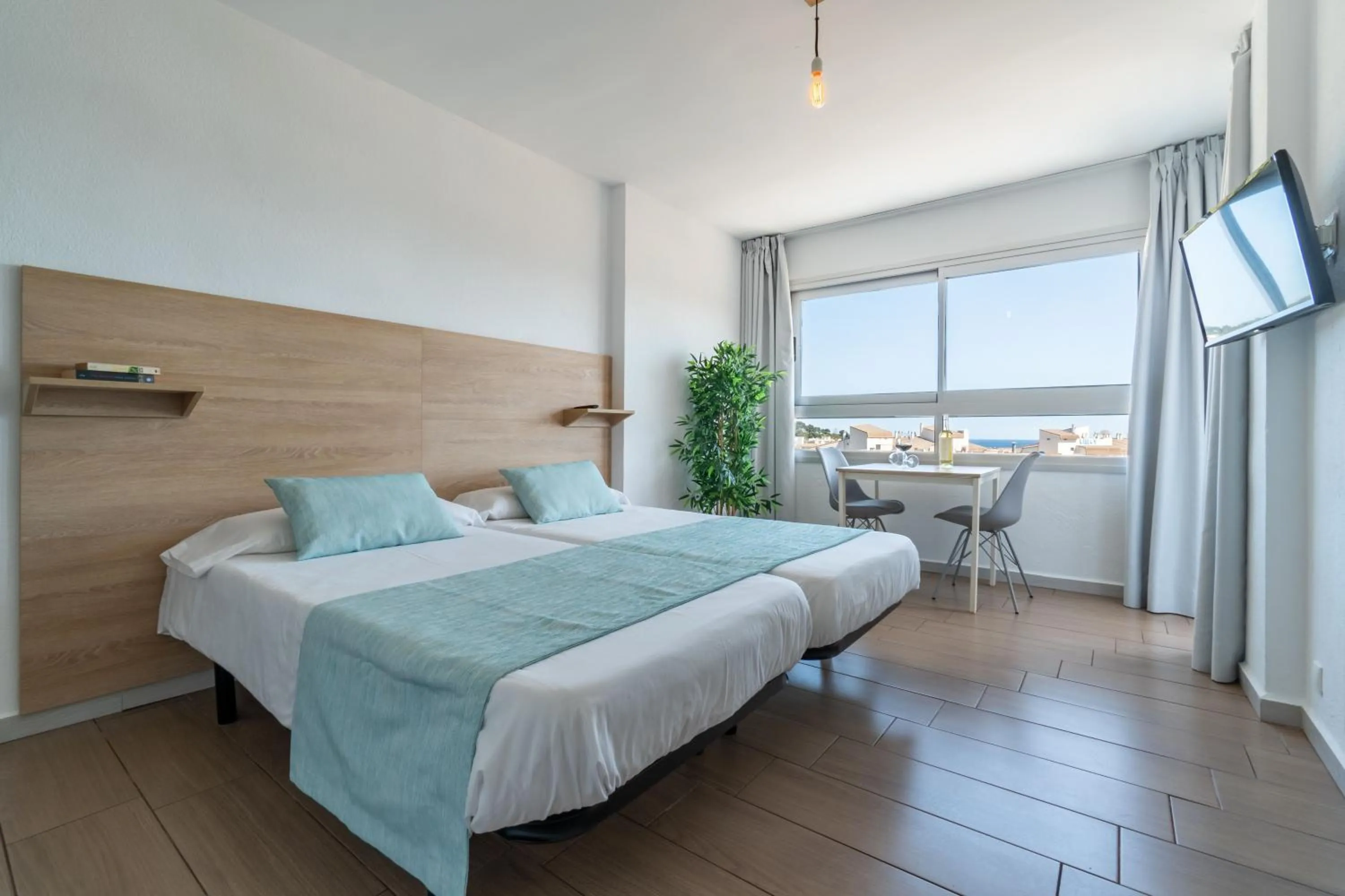 Bed in Apartaments La Perla Negra