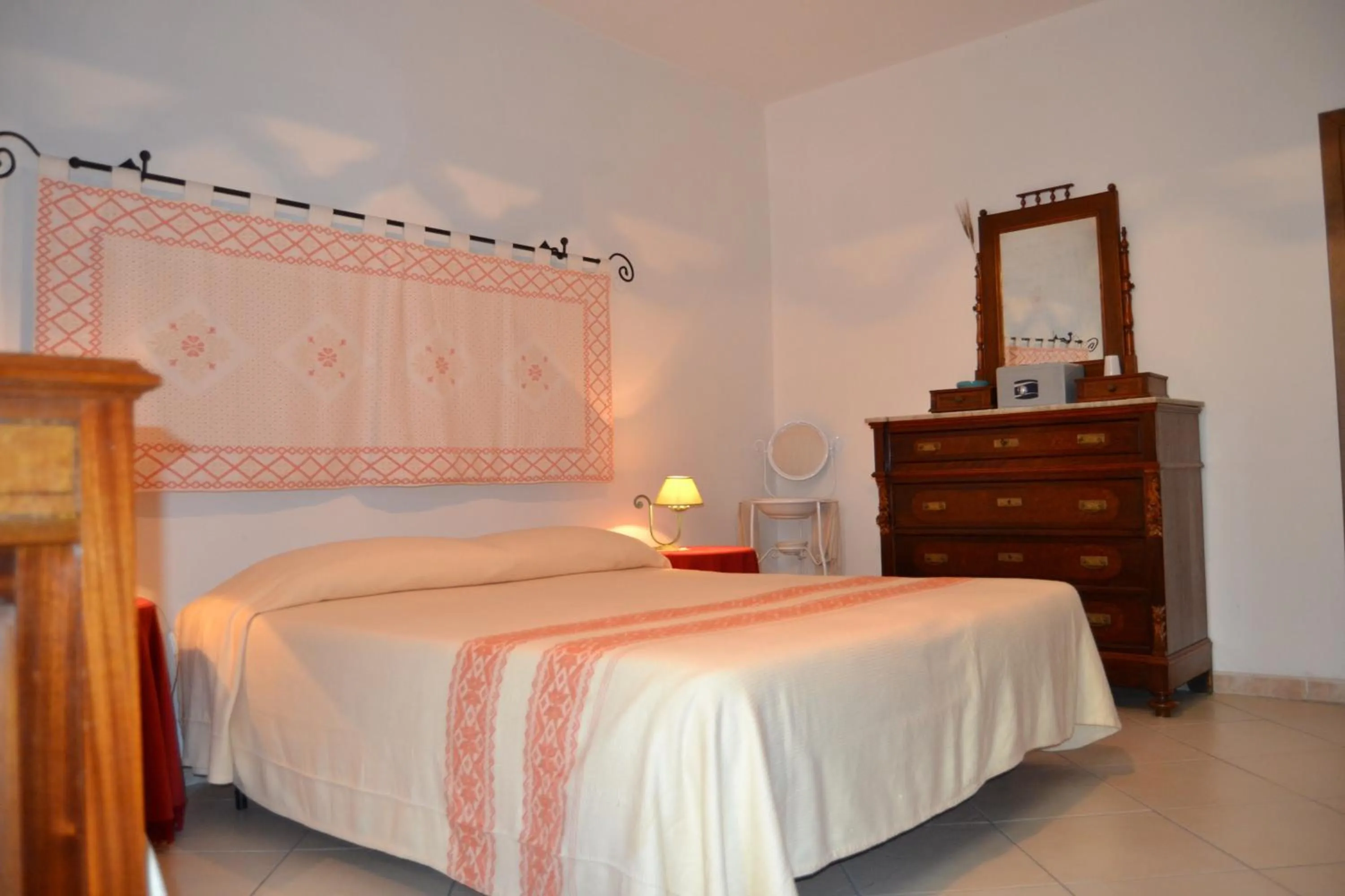 Bed in Su Cantaru Guesthouse