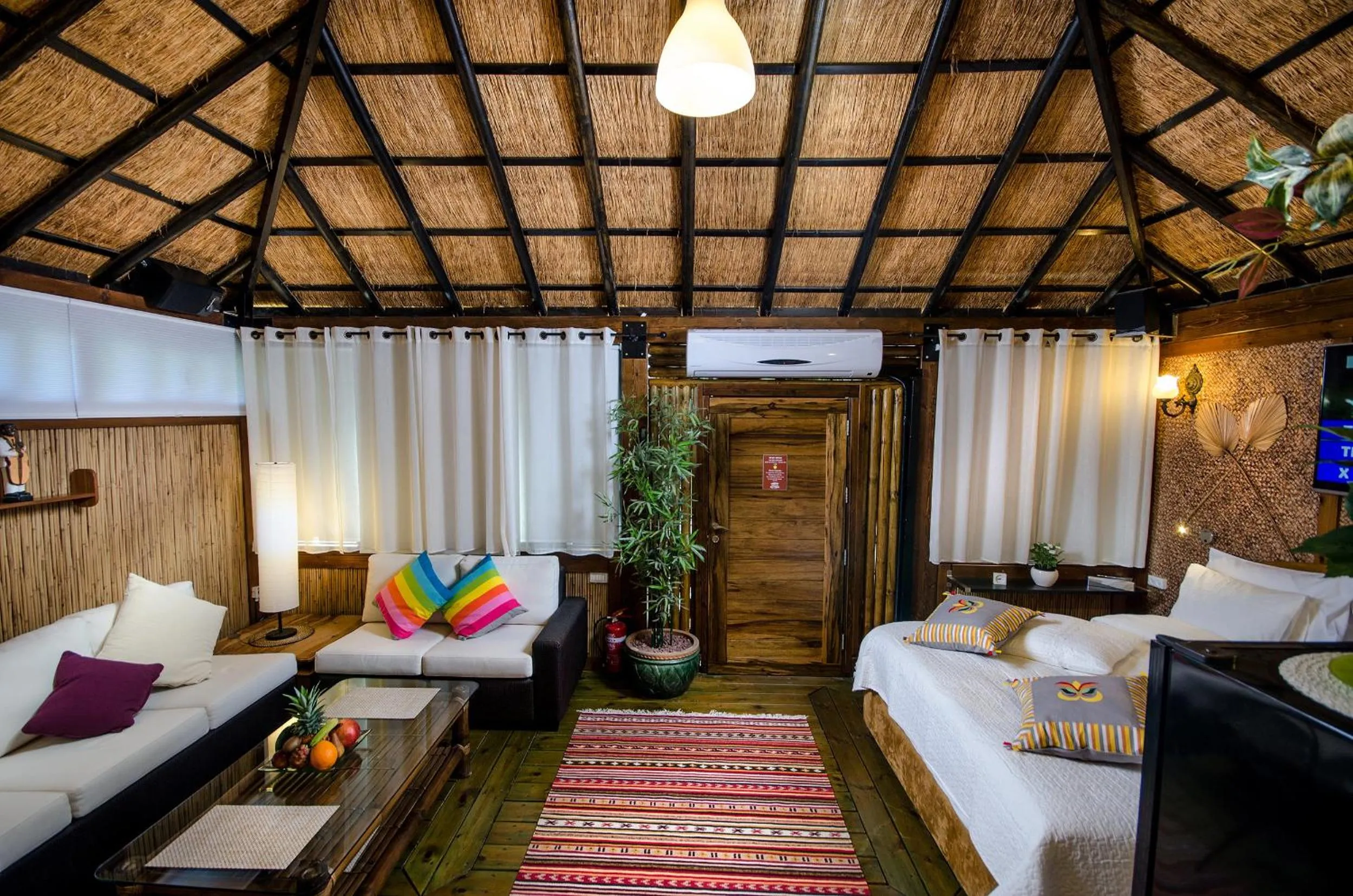 Living room, Bed in Out of Africa Resort