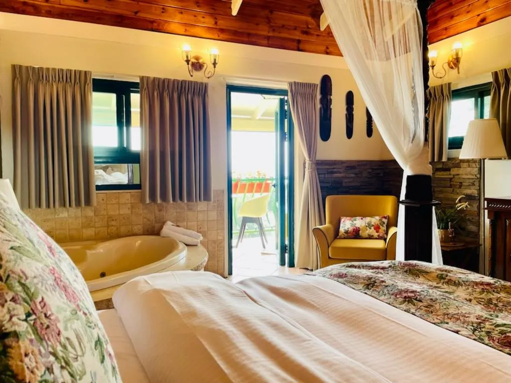 Bedroom, Bed in Out of Africa Resort