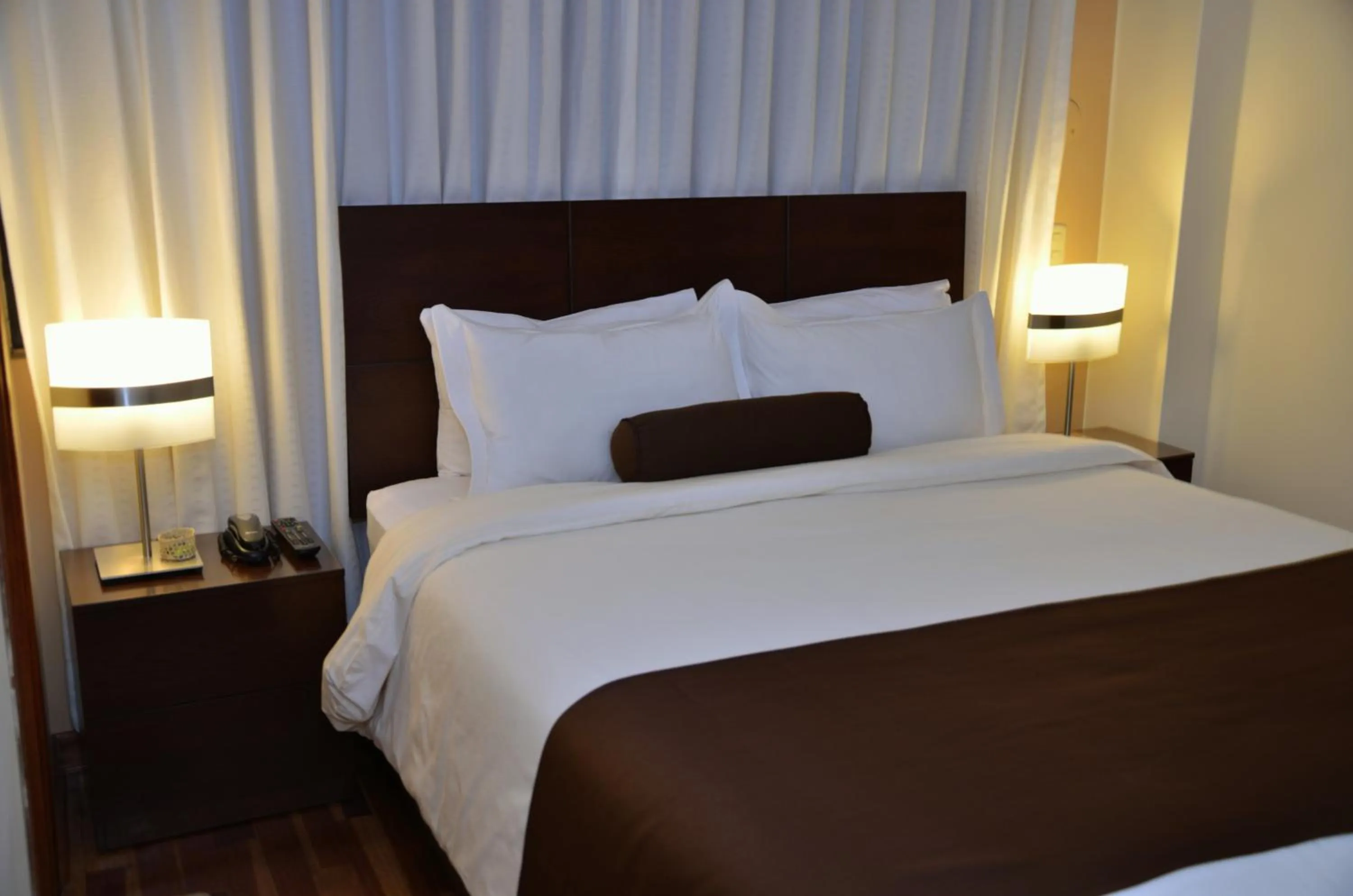 Bed in Kapac Inn Hotel