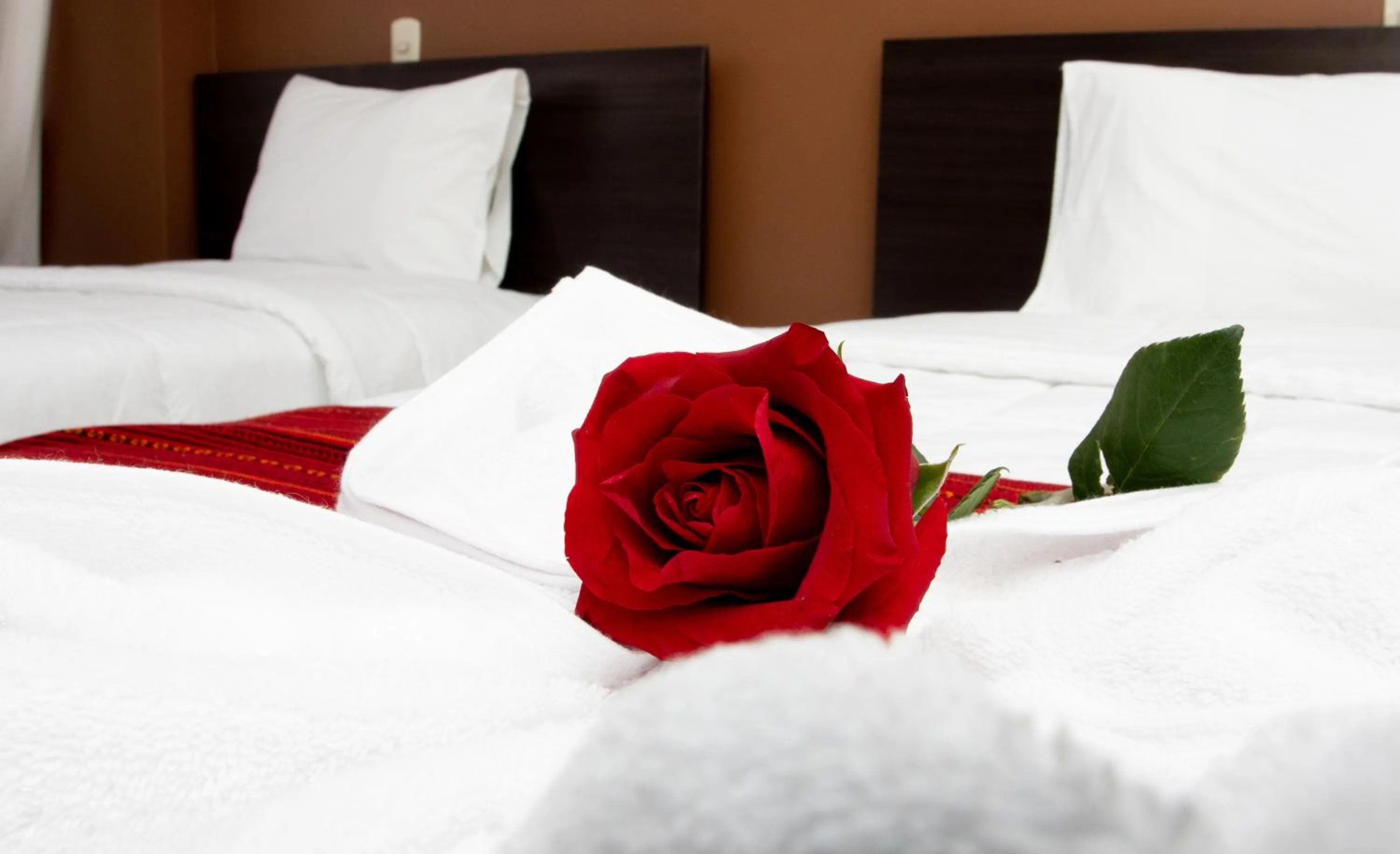 Bed in Kapac Inn Hotel