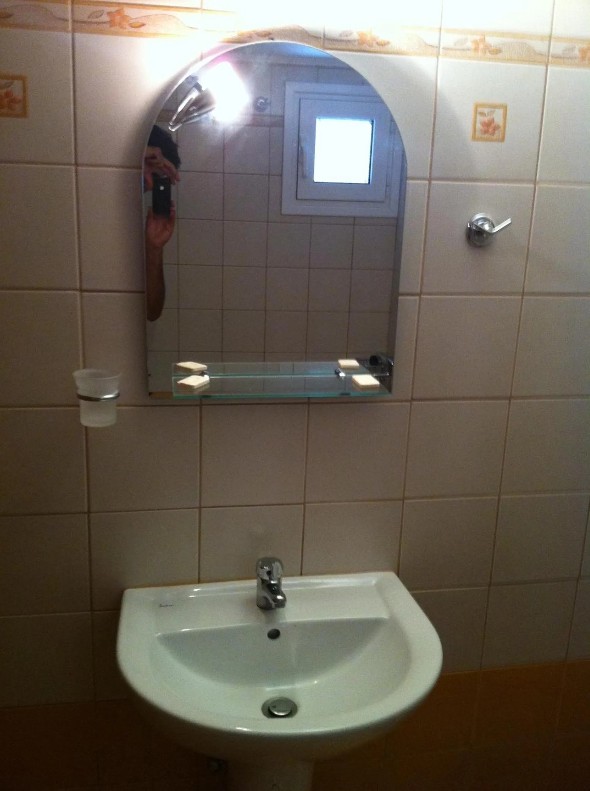 Bathroom in Ariadni Hotel Arvi by Estia