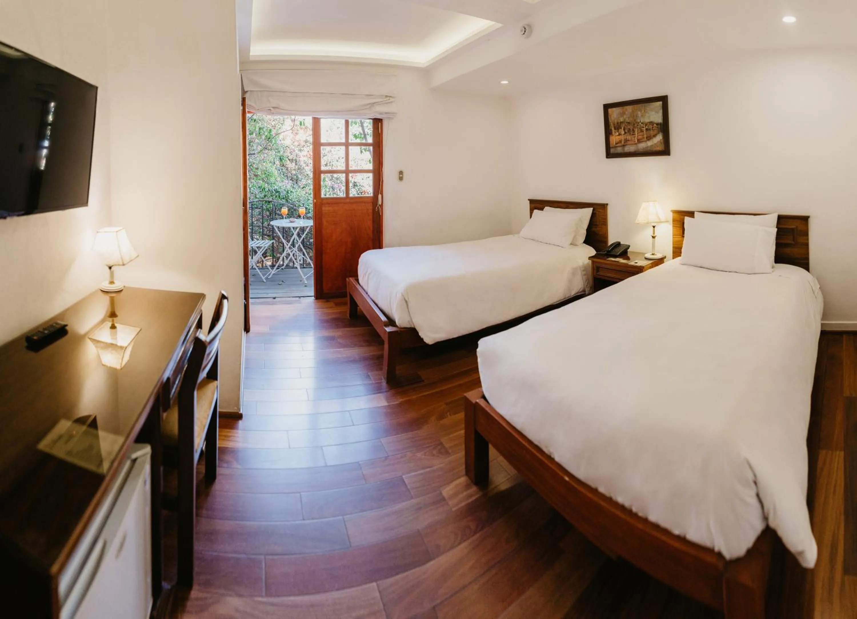 Bed in La Hostería Boutique Hotel