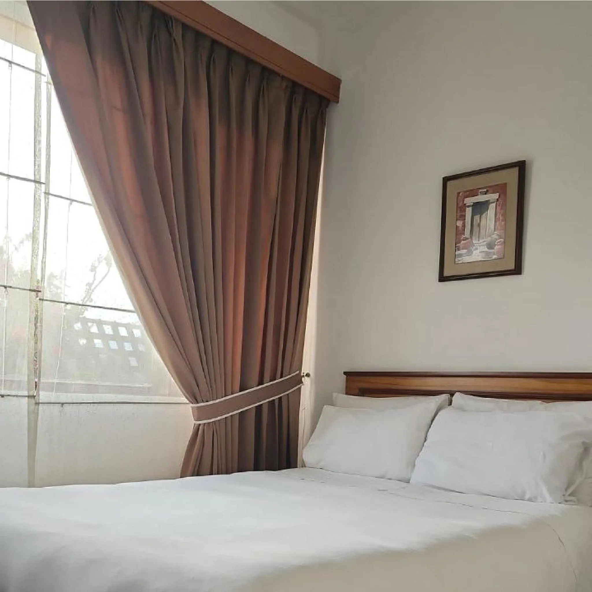 Bed in La Hostería Boutique Hotel