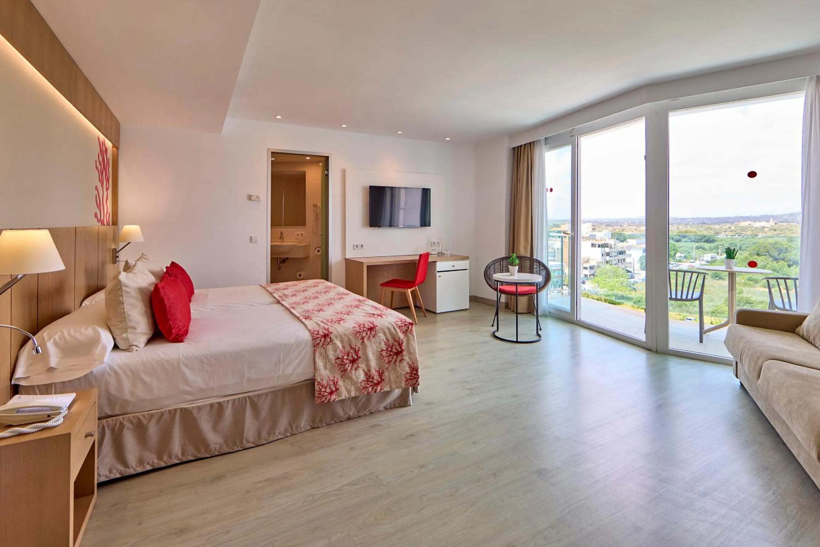 Bed in Universal Hotel Perla