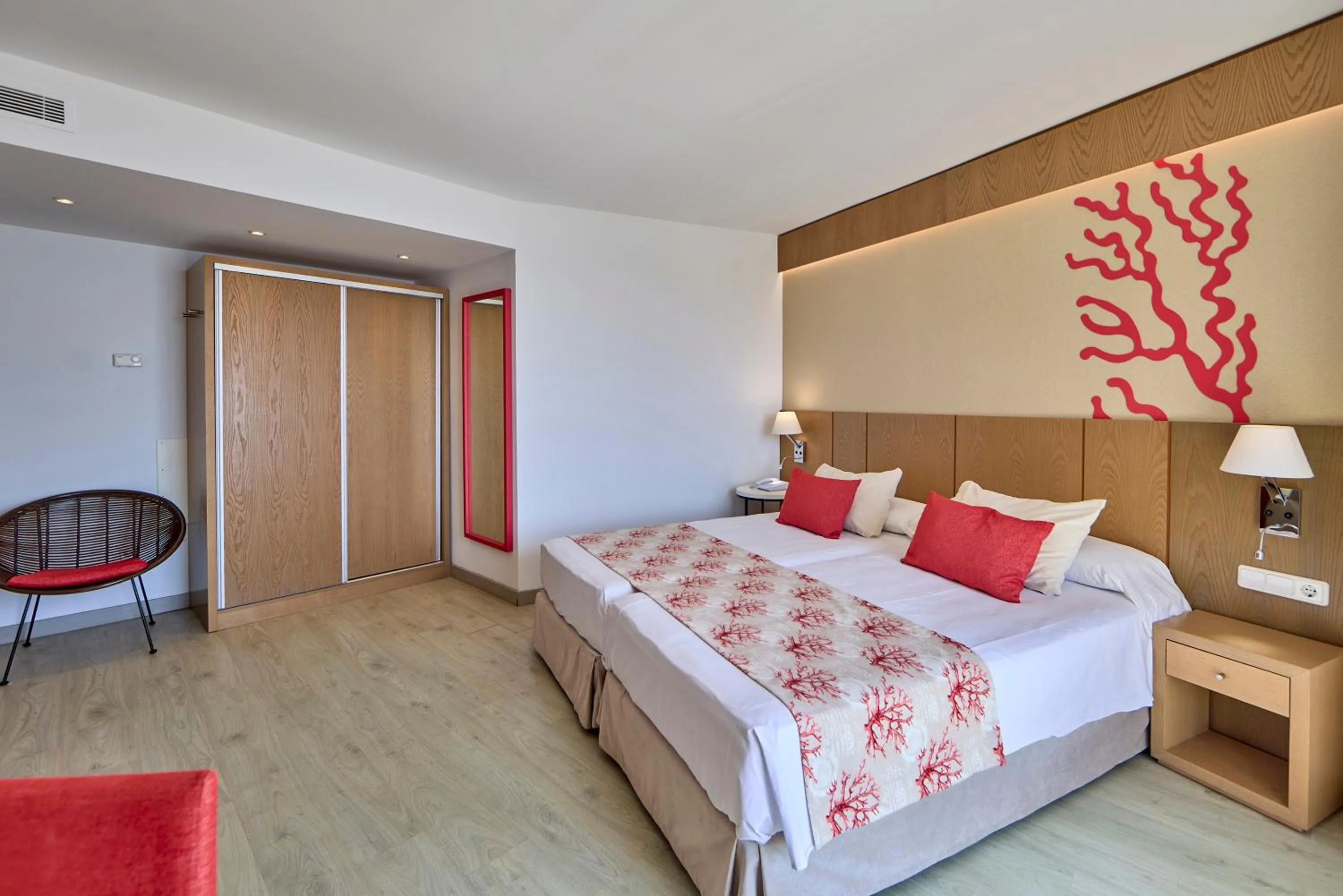 Bed in Universal Hotel Perla