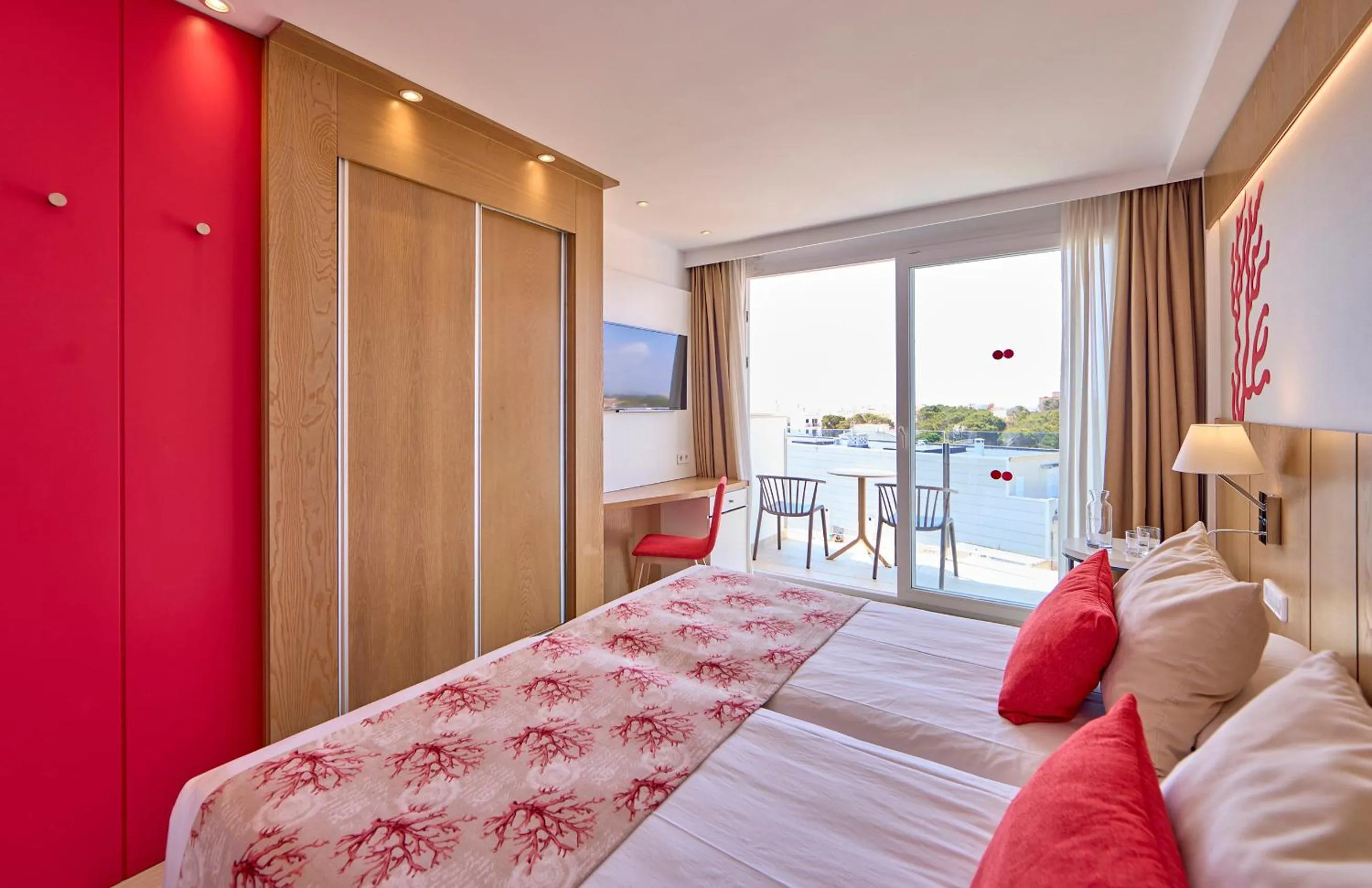 Bed in Universal Hotel Perla