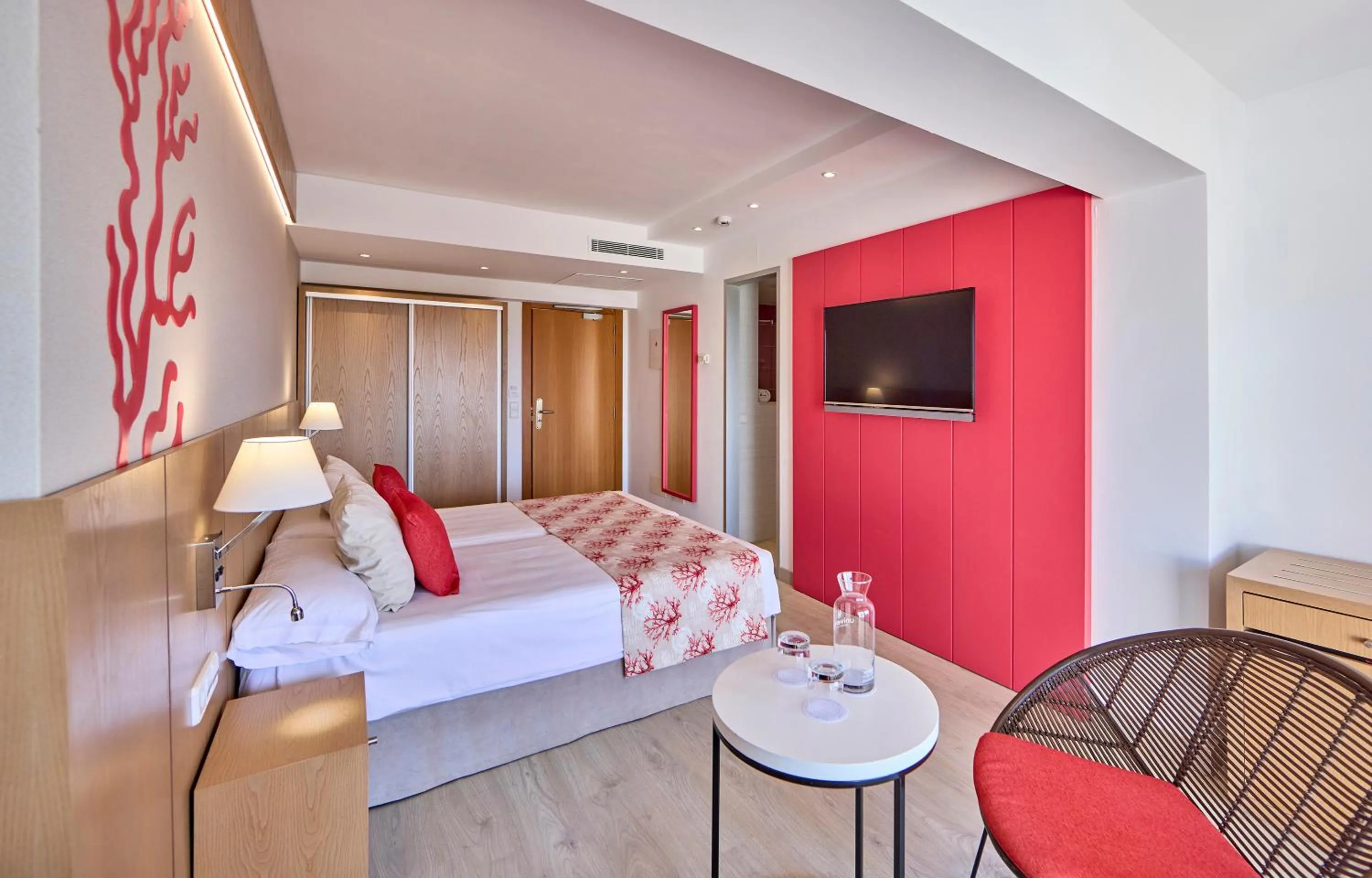 Bed in Universal Hotel Perla