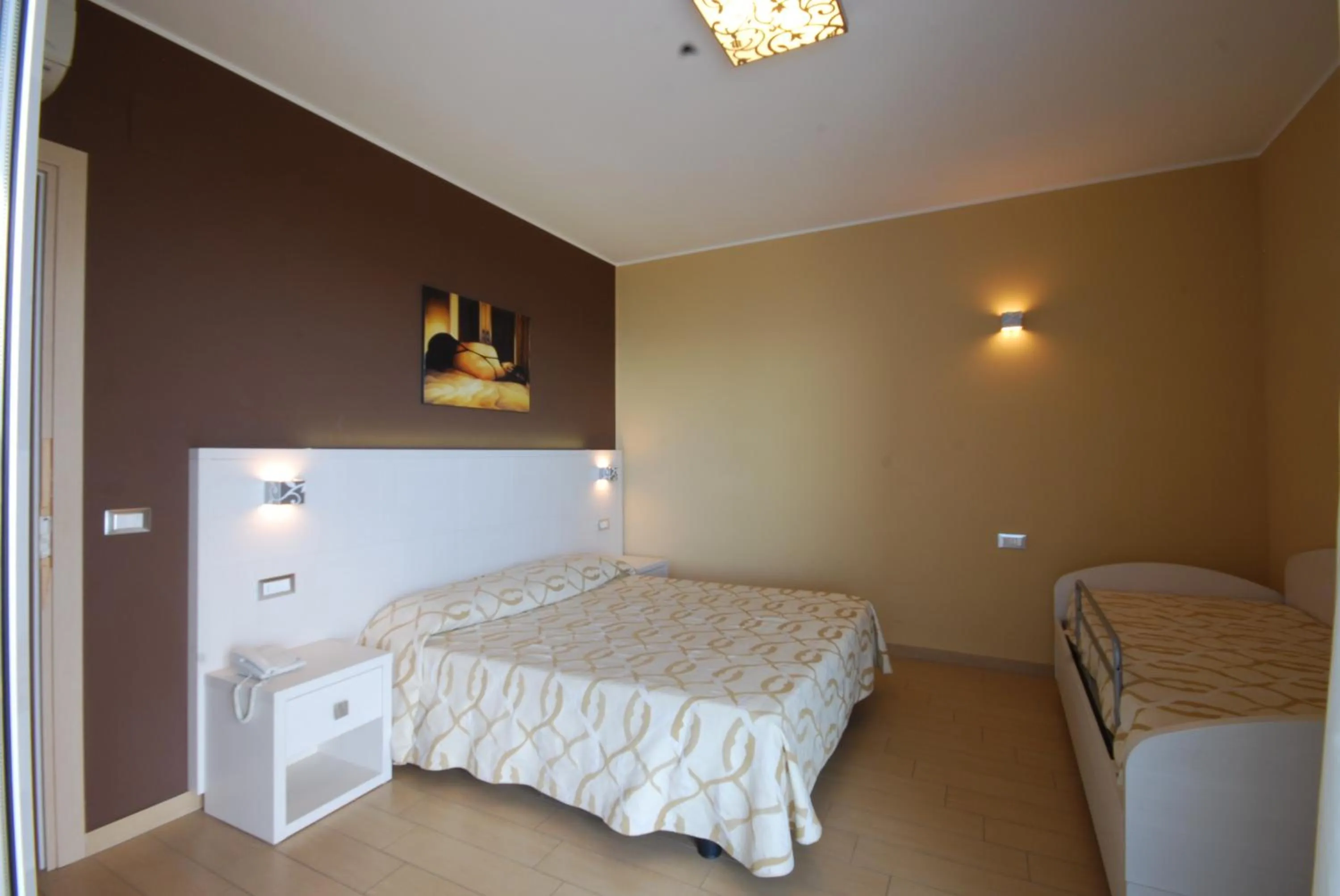 Photo of the whole room, Bed in Kiara Residence