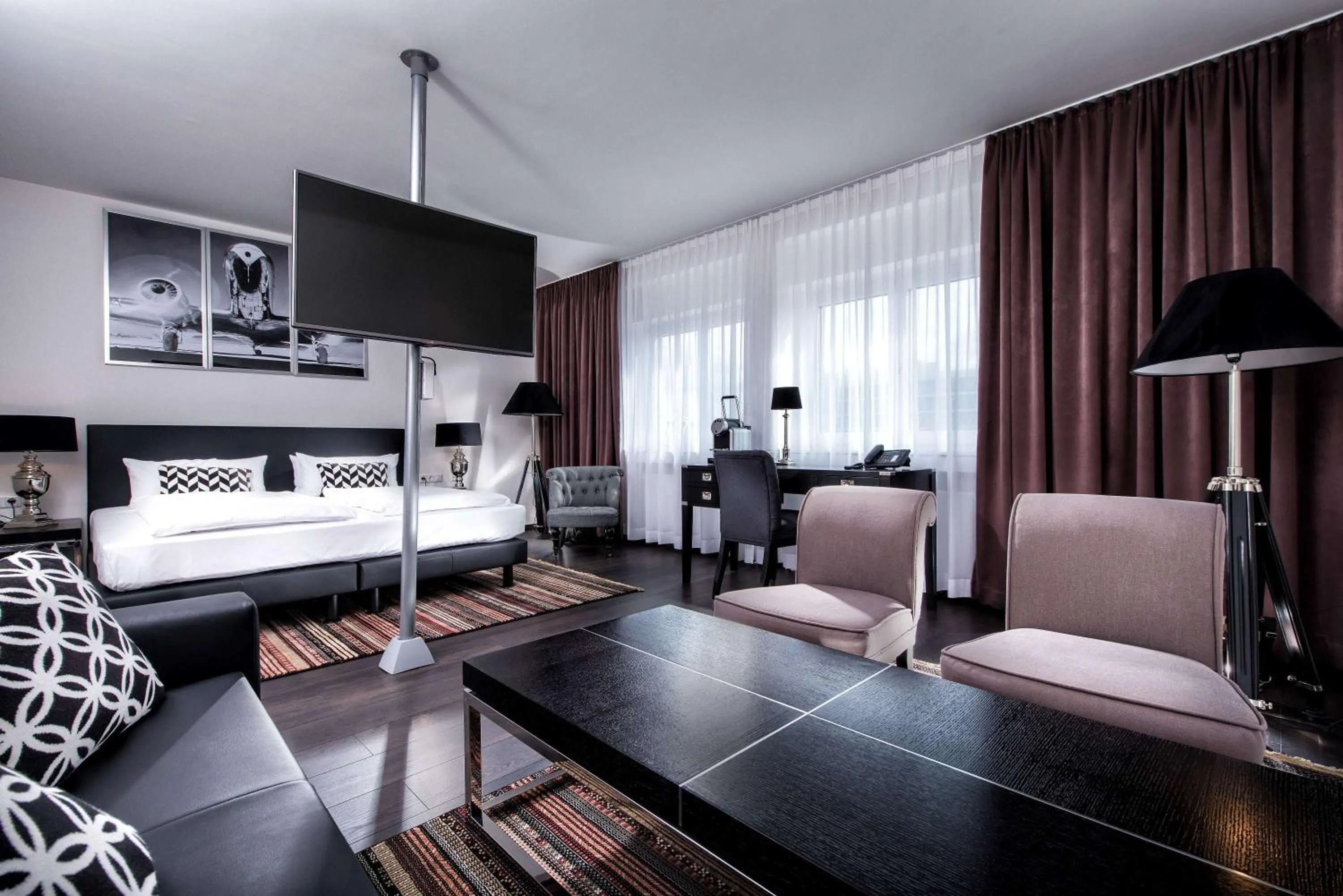 Photo of the whole room, Bed in Wyndham Stuttgart Airport Messe