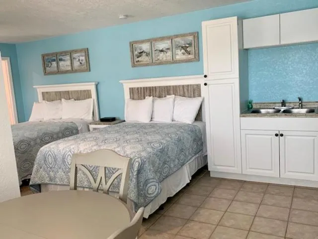 Bed in Tropical Cottages