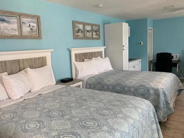 Bed in Tropical Cottages