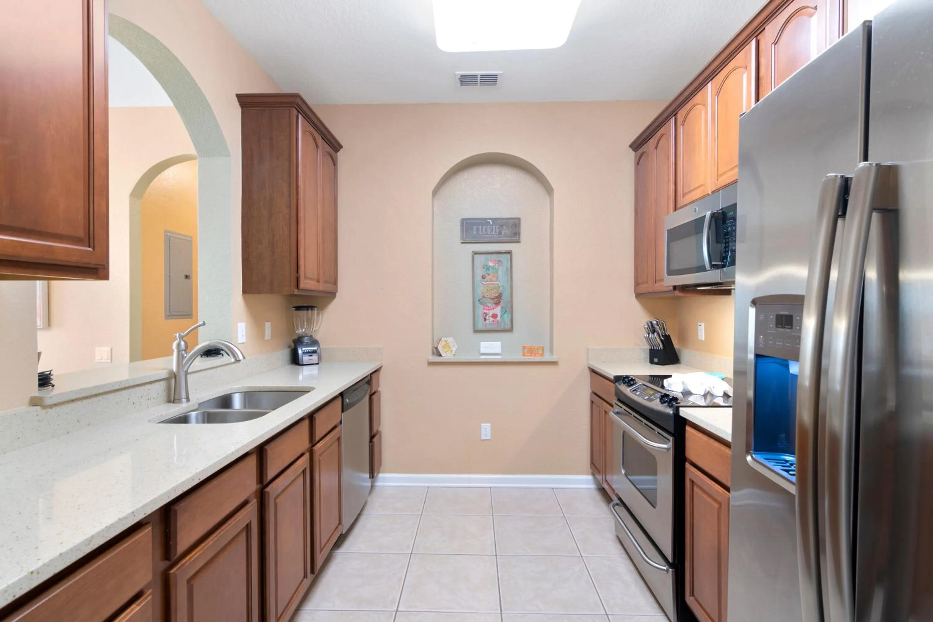 Kitchen or kitchenette in Orlando Resort Rentals at Universal Boulevard