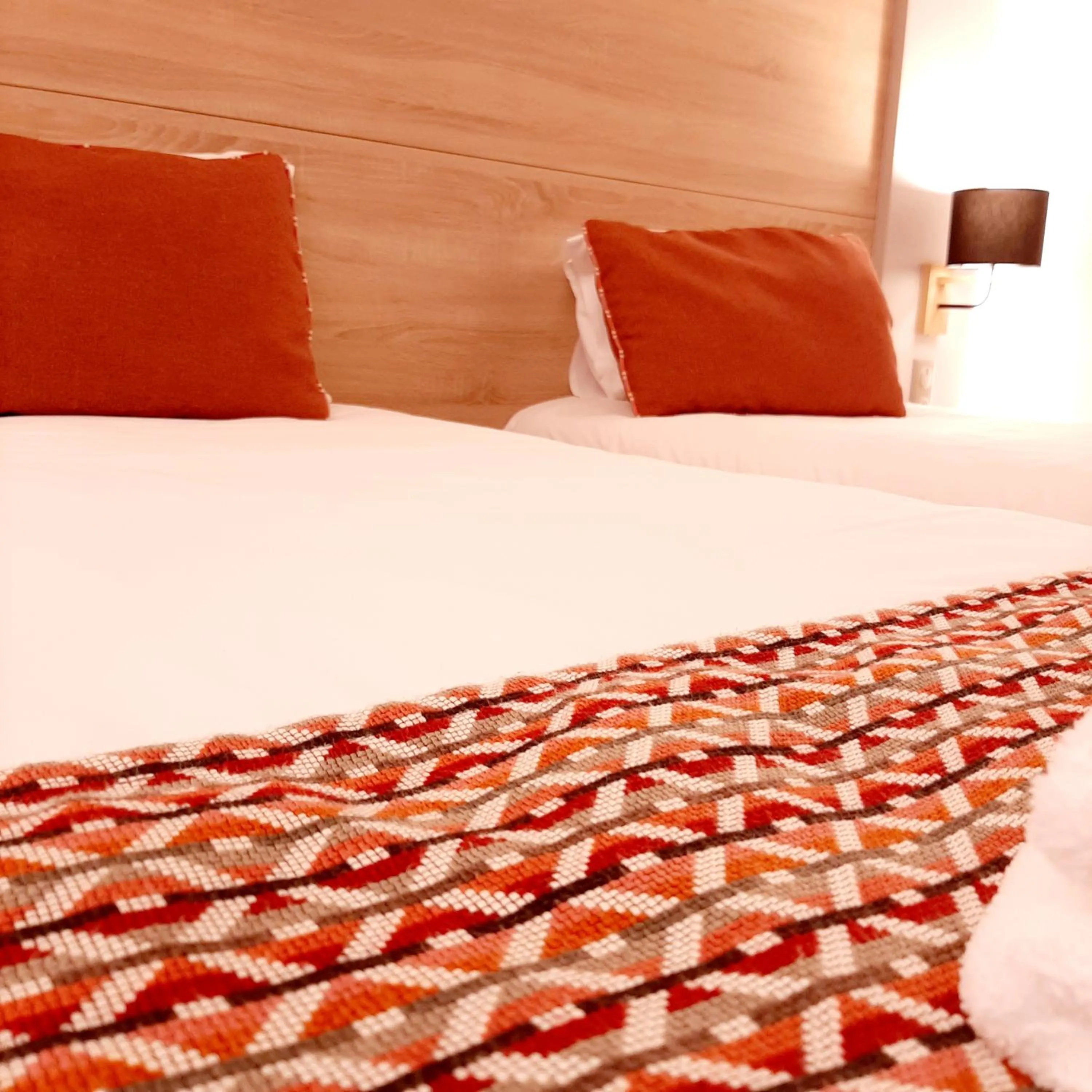 Bed in Logis Hotel Relais Saint Jacques - Châteauroux