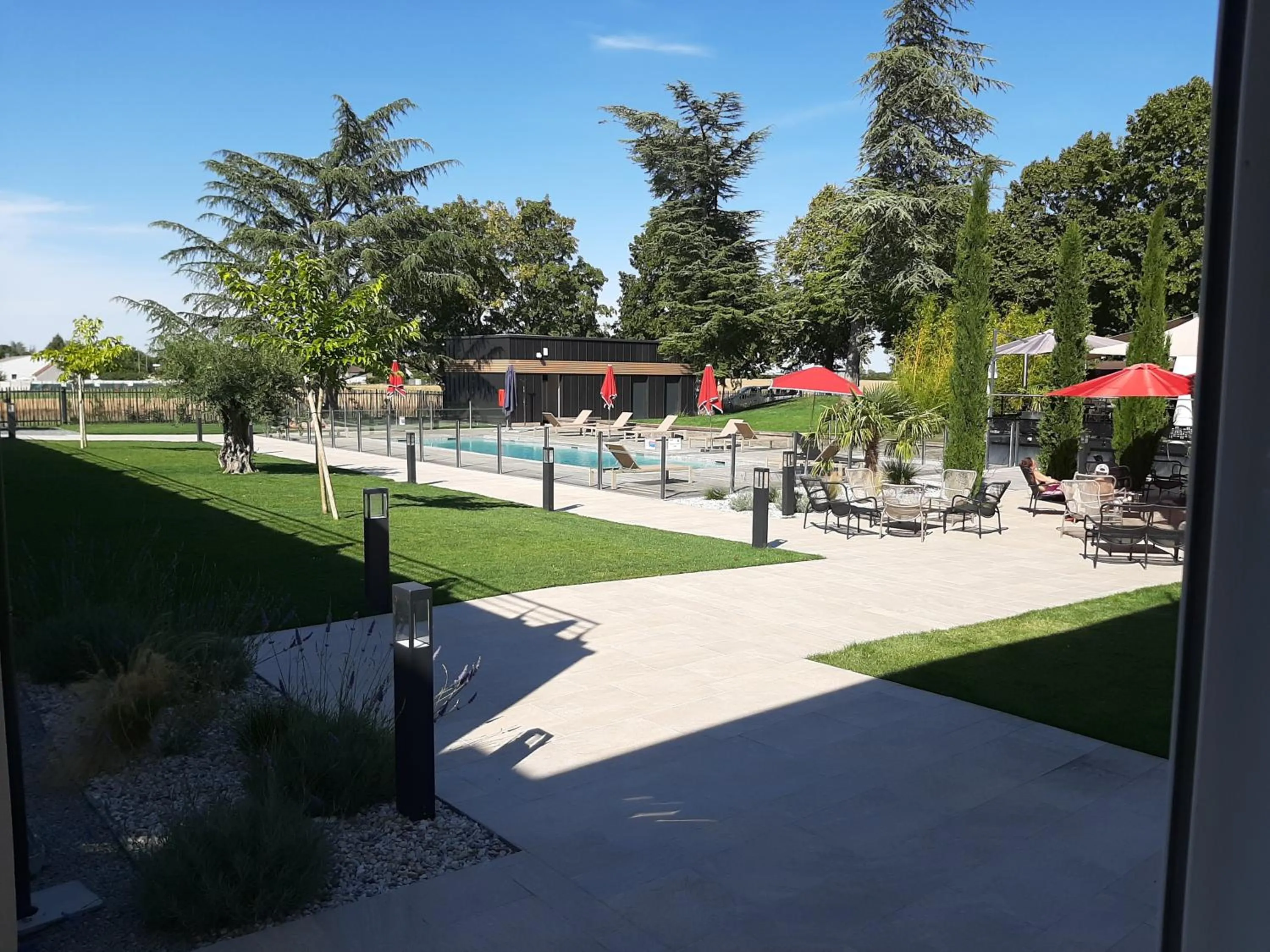 Pool view in Logis Hotel Relais Saint Jacques - Châteauroux