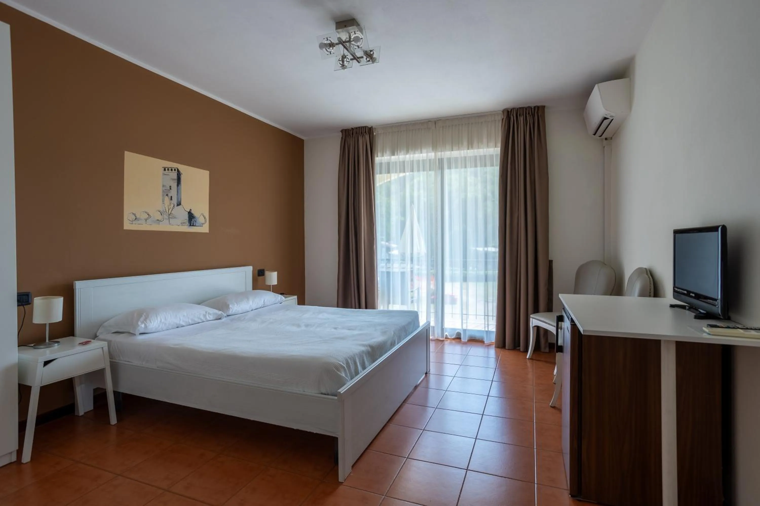 Bed in Hotel Fontaine Bleue