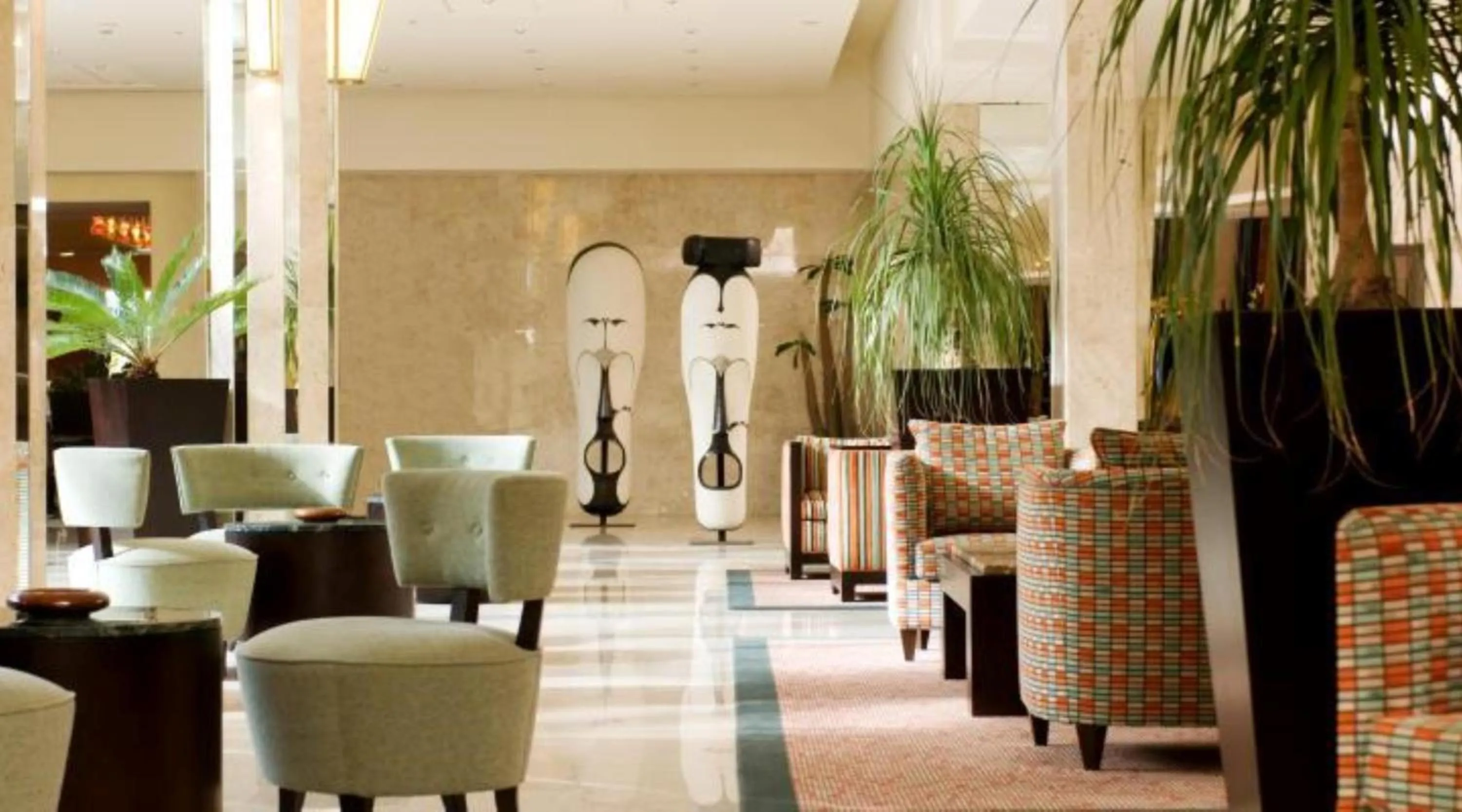 Communal lounge/ TV room in King Fahd Palace Hotel