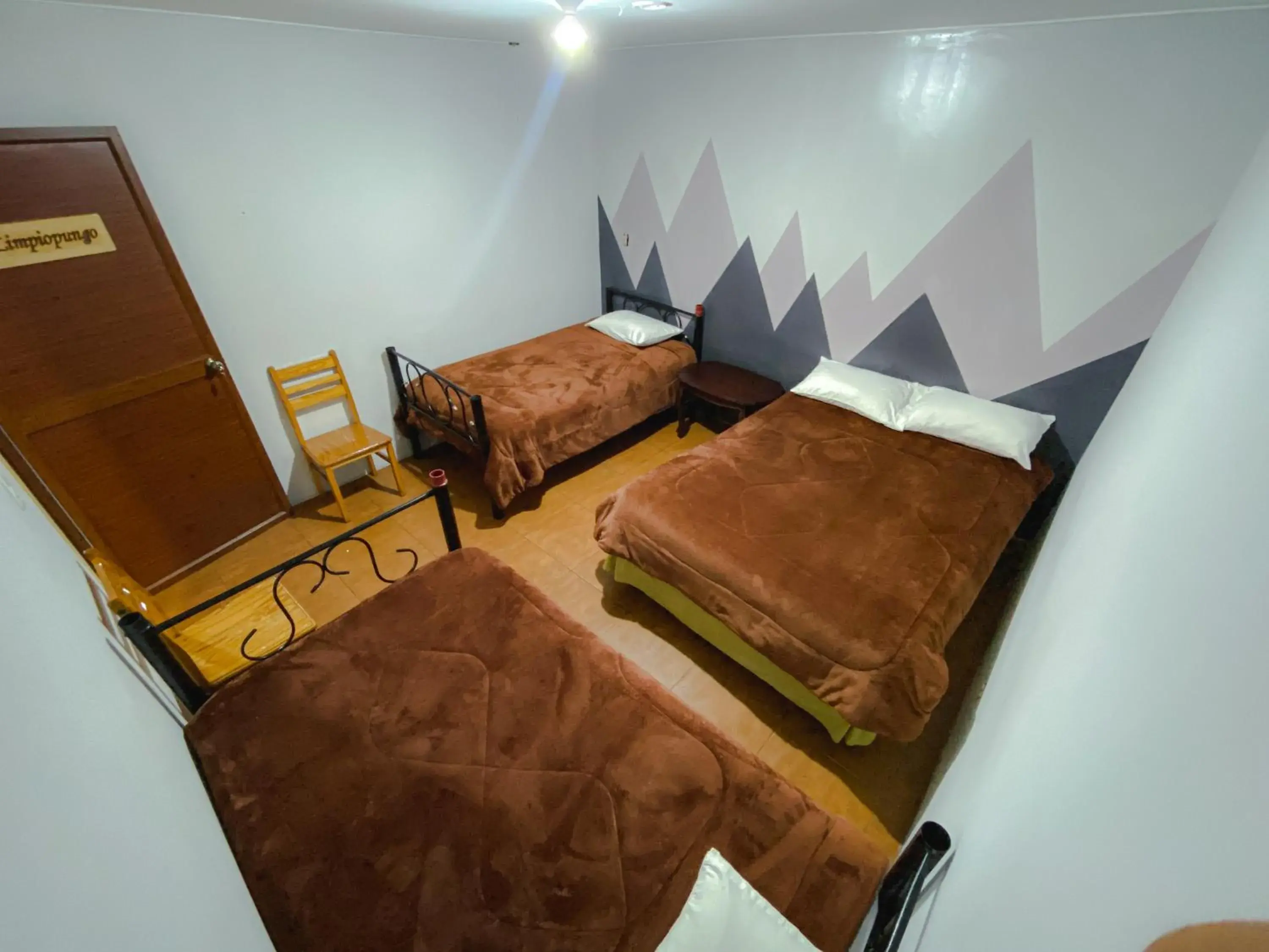 Economy Quadruple Room with Shared Bathroom in Villa de Tacvnga Hotel Economy Quadruple Room with Shared Bathroom in Villa de Tacvnga Hotel