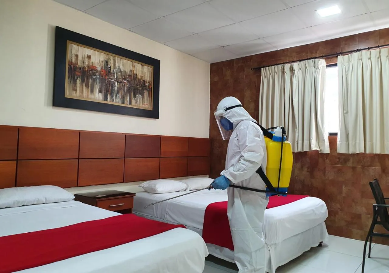 Bedroom, Bed in Hoteles en Guayaquil - Suites Guayaquil Cerca del Aeropuerto