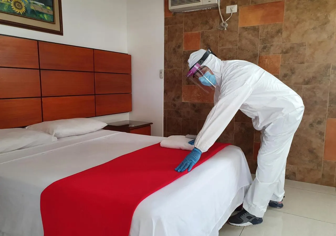 Bedroom in Hoteles en Guayaquil - Suites Guayaquil Cerca del Aeropuerto