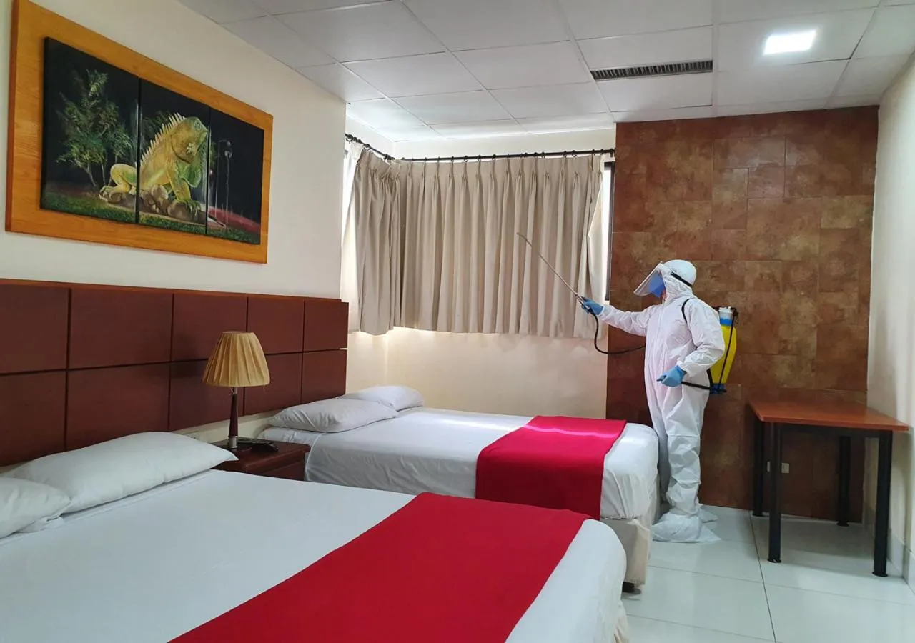 Photo of the whole room, Bed in Hoteles en Guayaquil - Suites Guayaquil Cerca del Aeropuerto