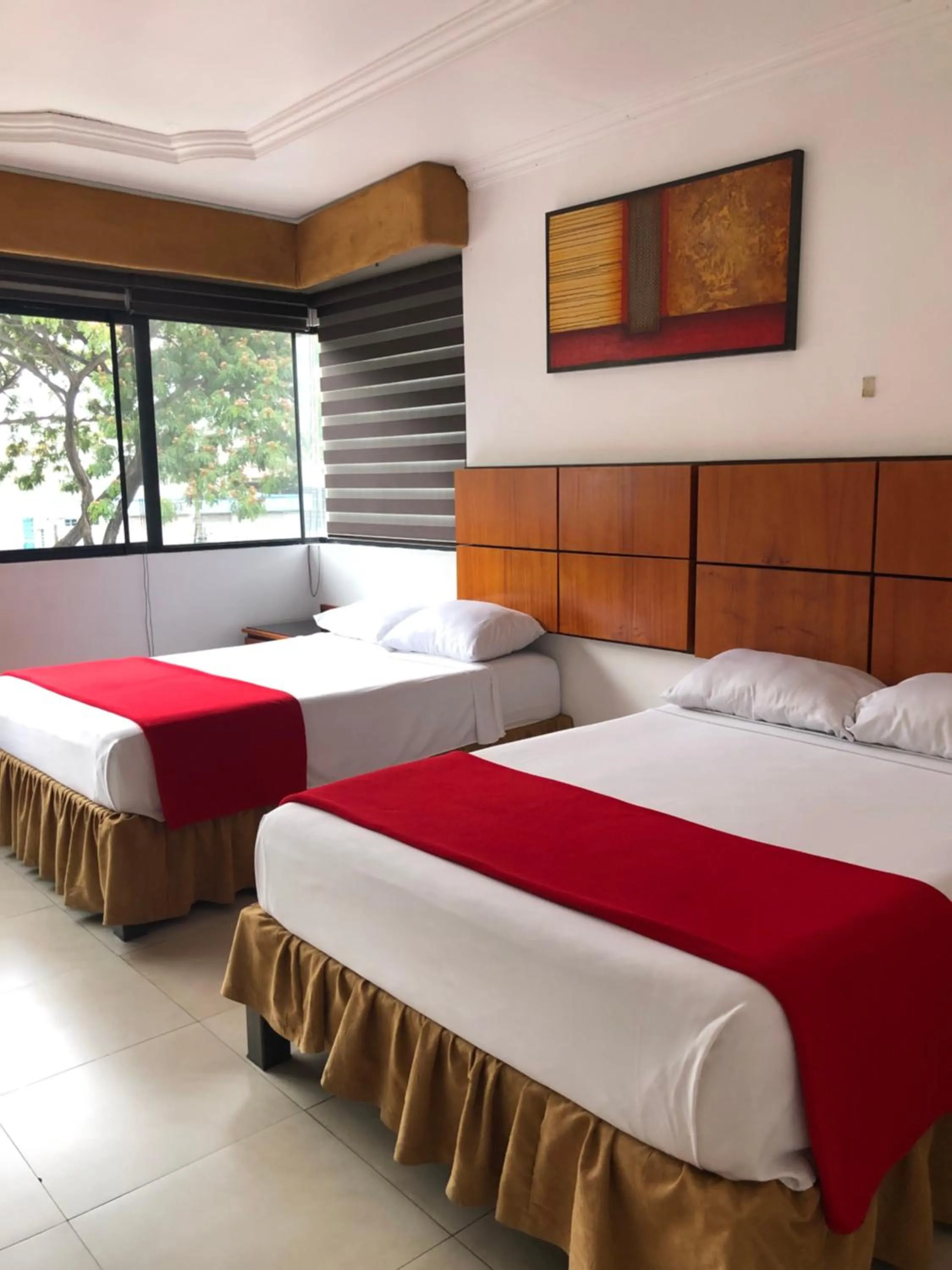 Bed in Hoteles en Guayaquil - Suites Guayaquil Cerca del Aeropuerto