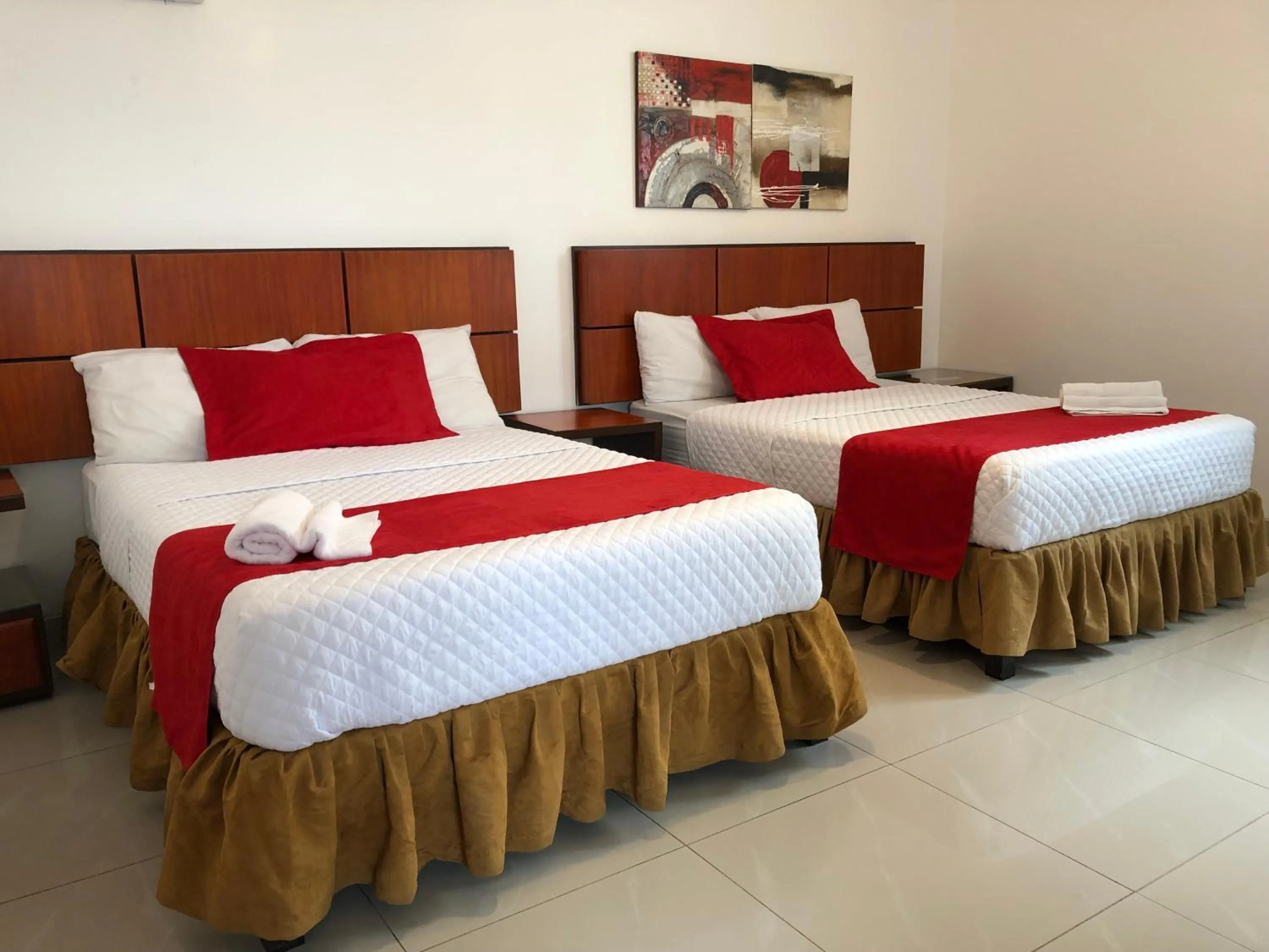 Photo of the whole room, Bed in Hoteles en Guayaquil - Suites Guayaquil Cerca del Aeropuerto