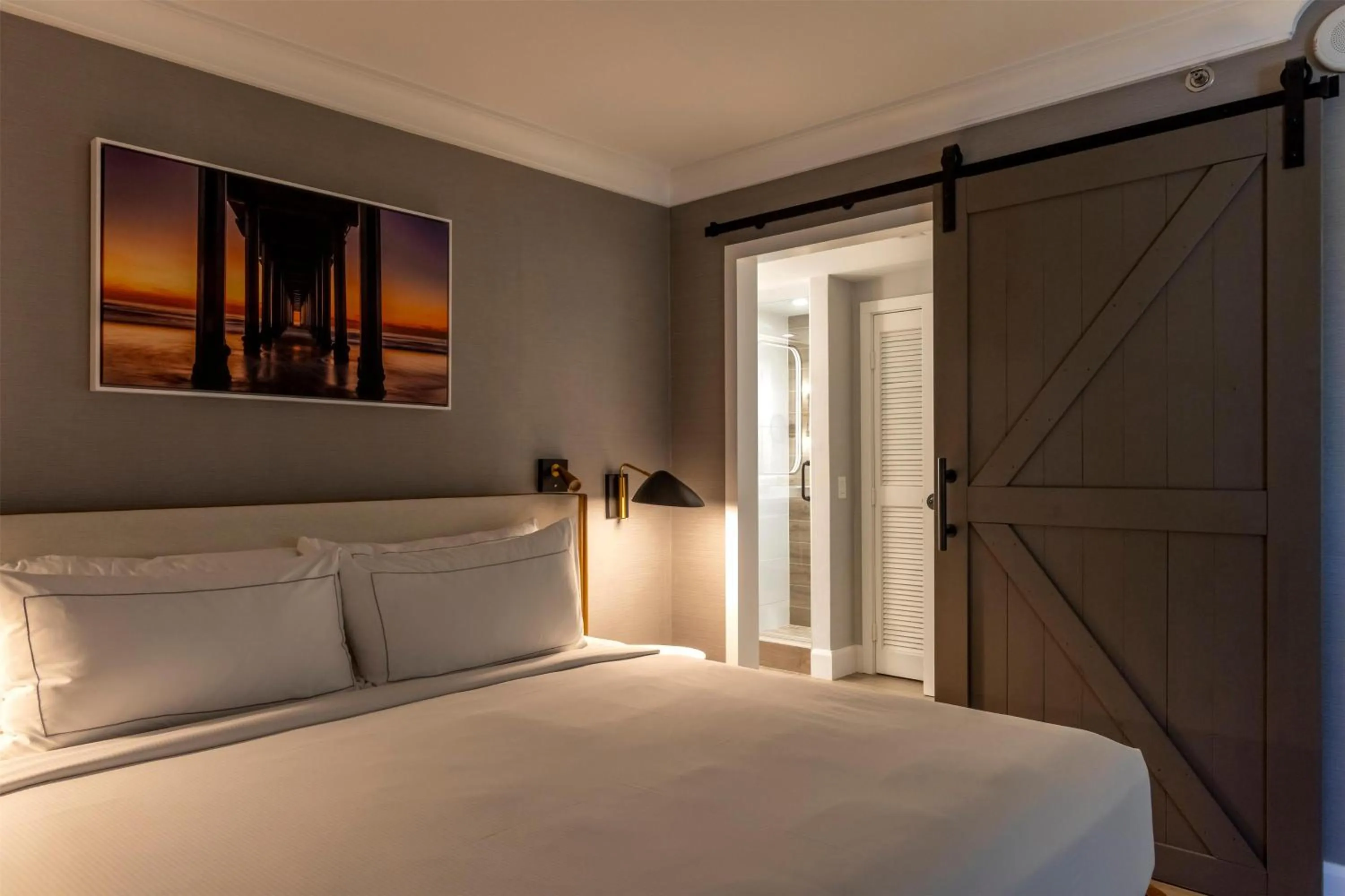 Bed in The Waterfront Beach Resort, A Hilton Hotel