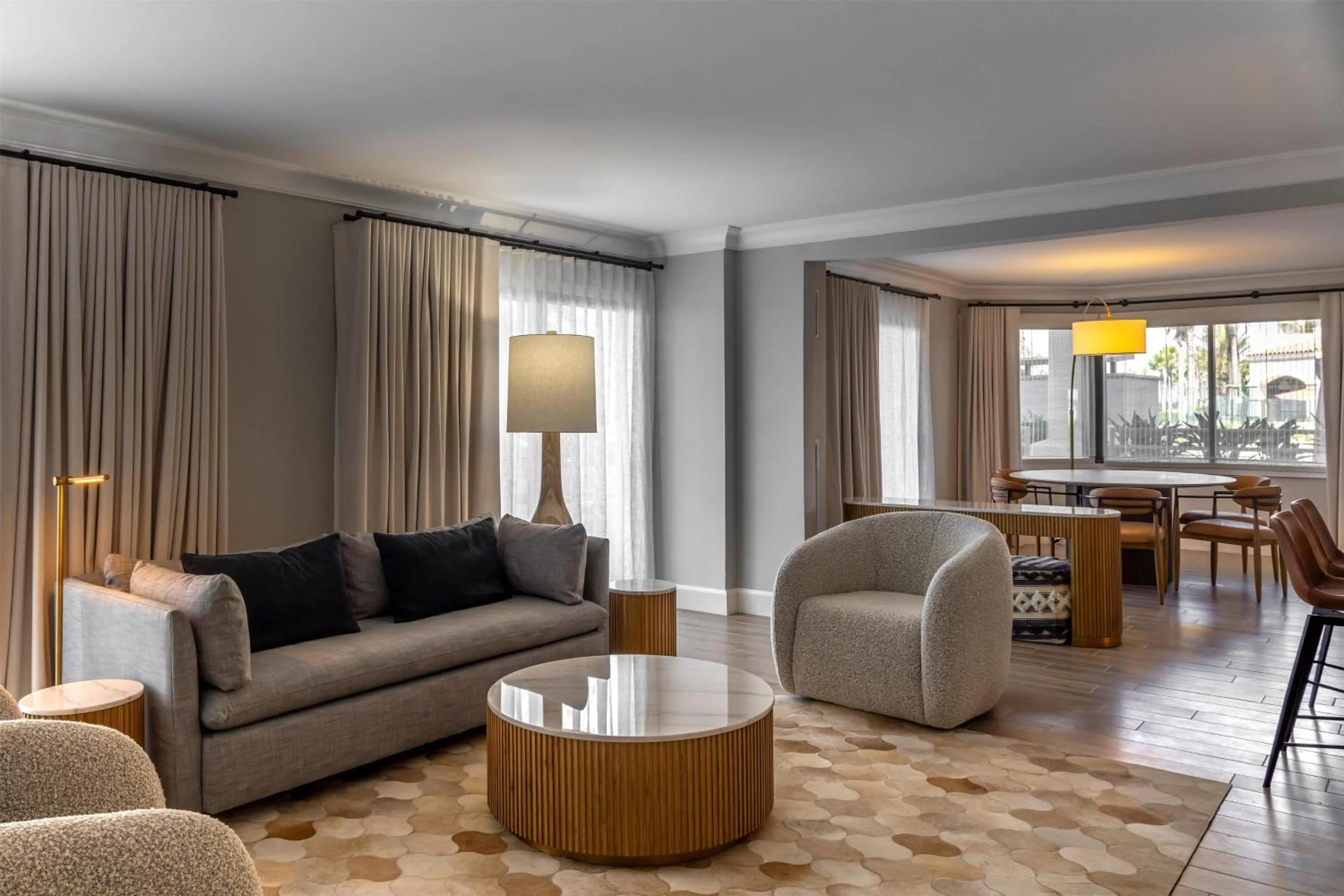 Living room in The Waterfront Beach Resort, A Hilton Hotel