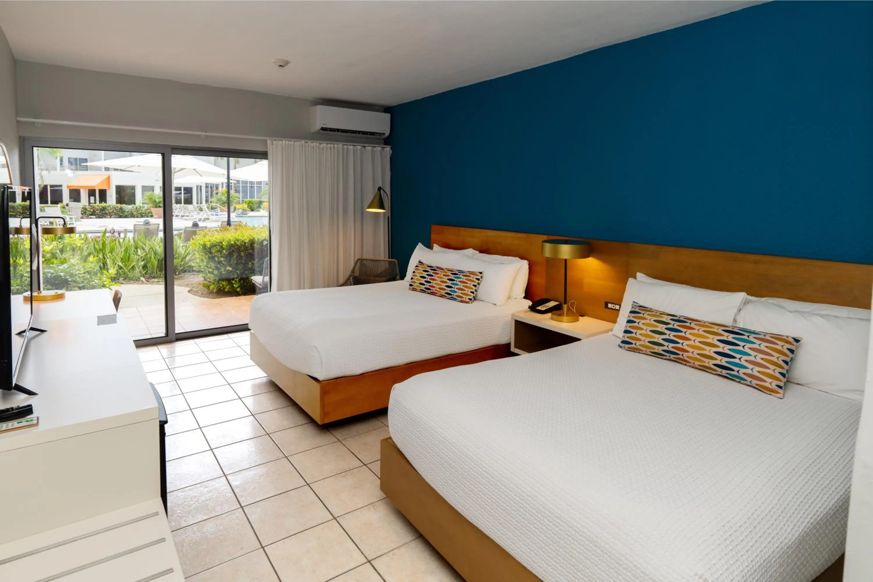 Bed in Rincon of the Seas Grand Caribbean Hotel