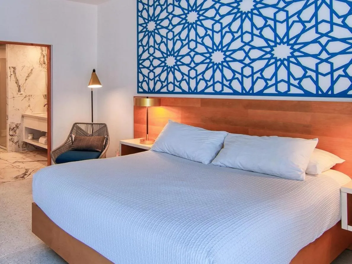 Bed in Rincon of the Seas Grand Caribbean Hotel