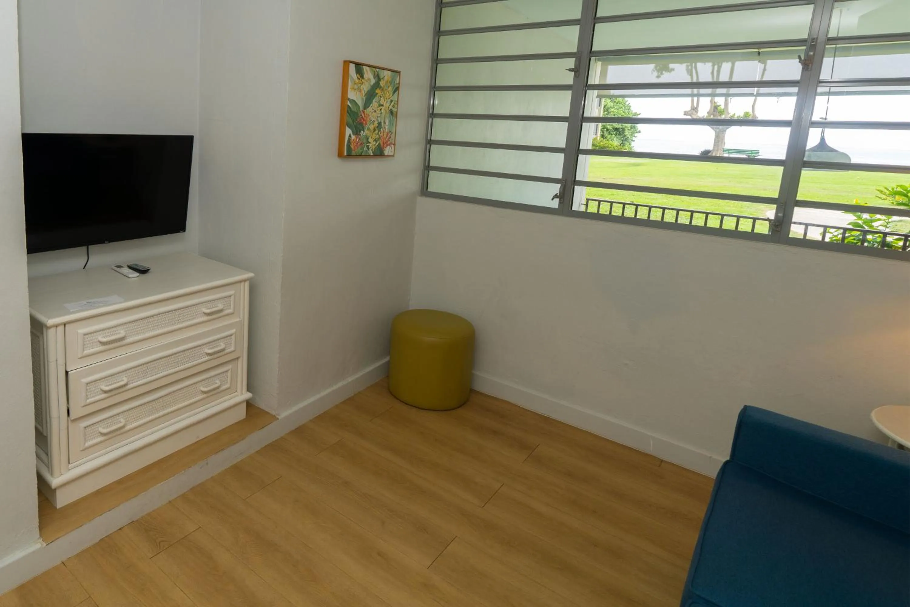 Communal lounge/ TV room in Rincon of the Seas Grand Caribbean Hotel