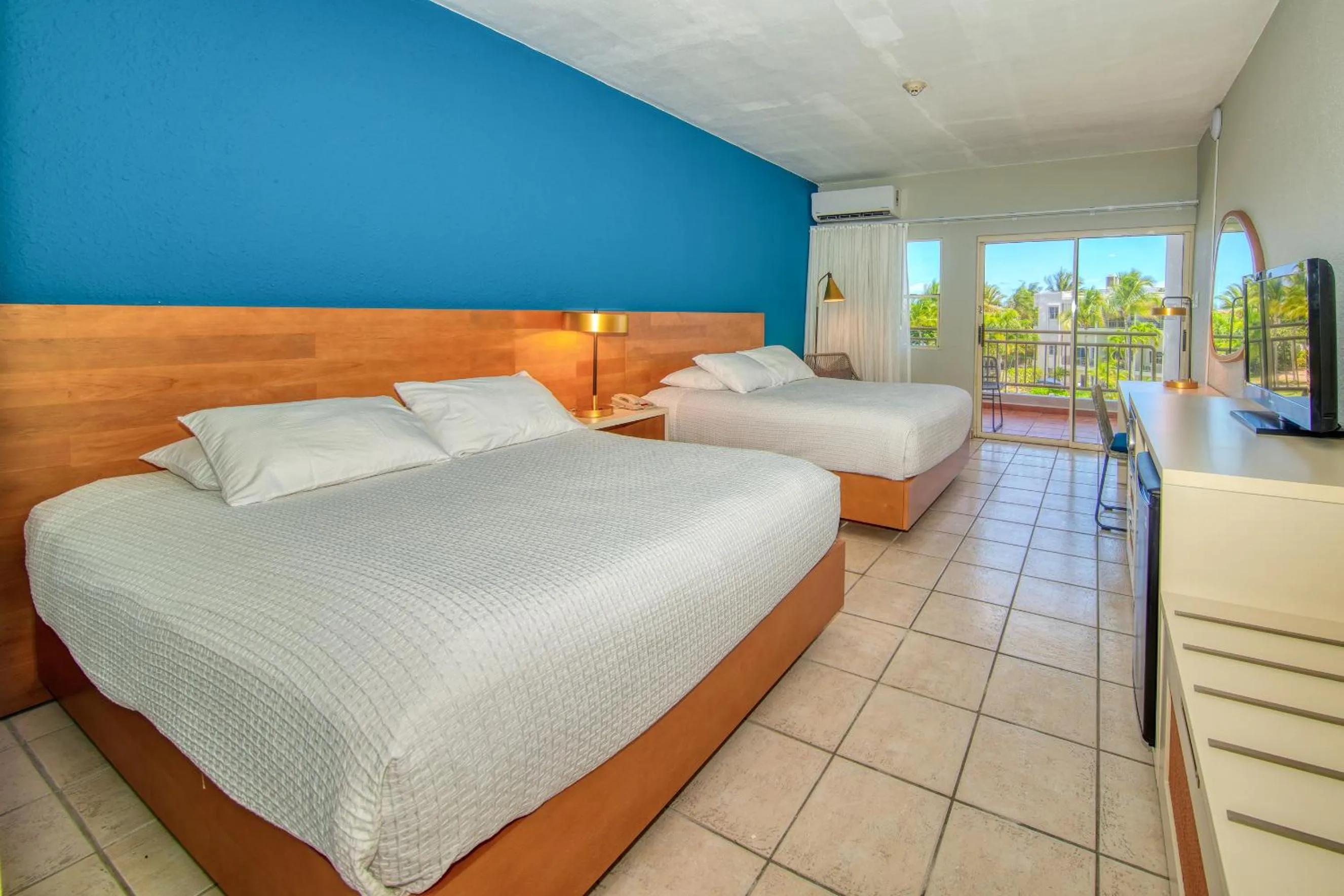 Bed in Rincon of the Seas Grand Caribbean Hotel