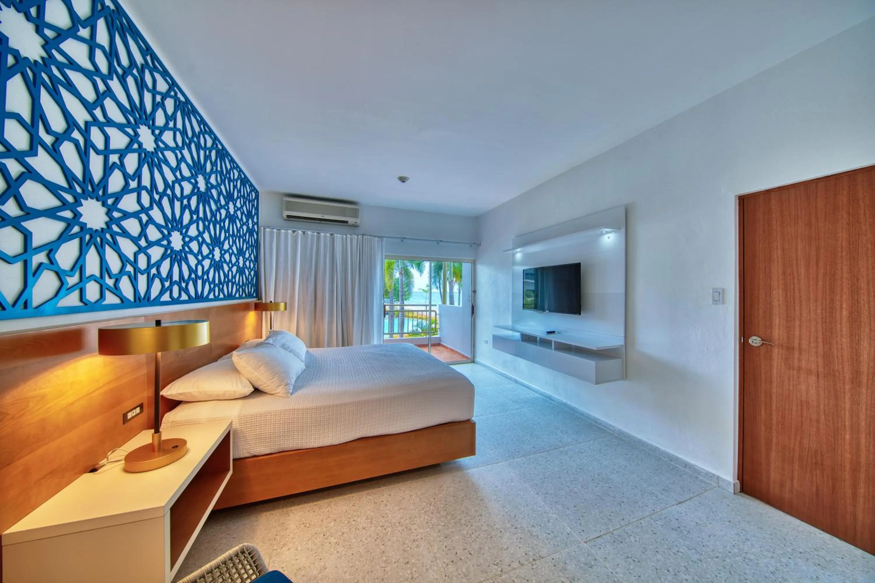 Bed in Rincon of the Seas Grand Caribbean Hotel