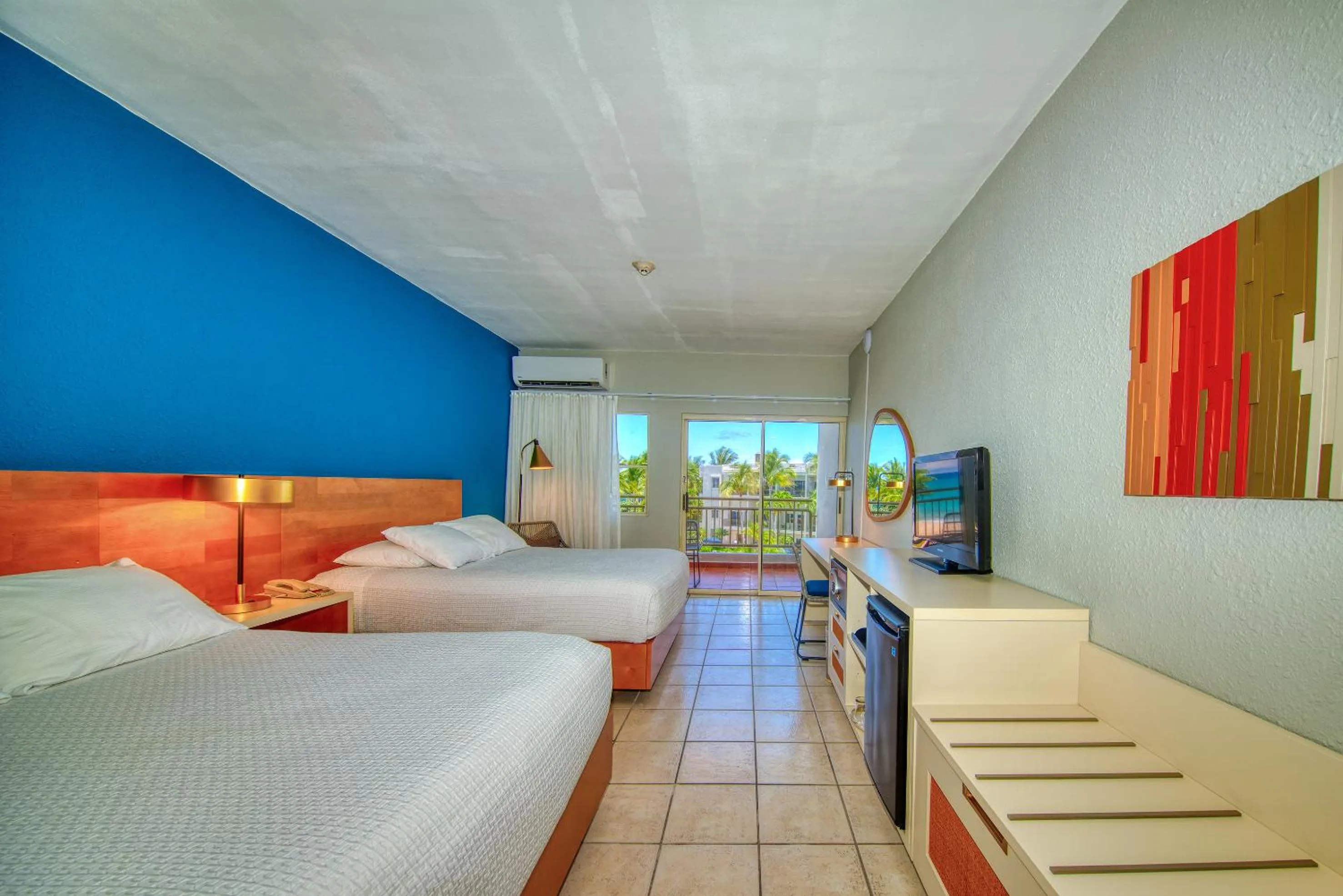 Bed in Rincon of the Seas Grand Caribbean Hotel