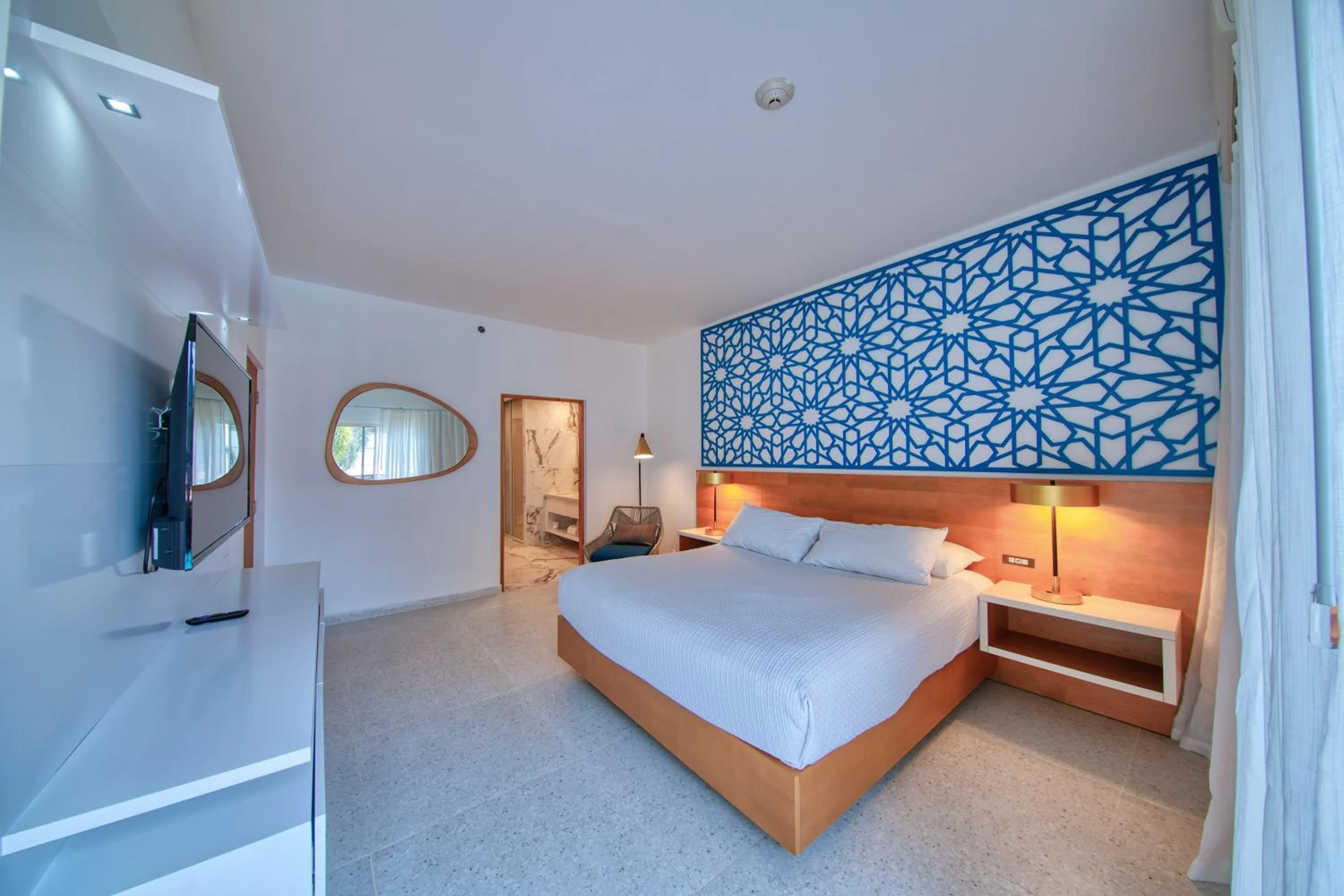 Bed in Rincon of the Seas Grand Caribbean Hotel