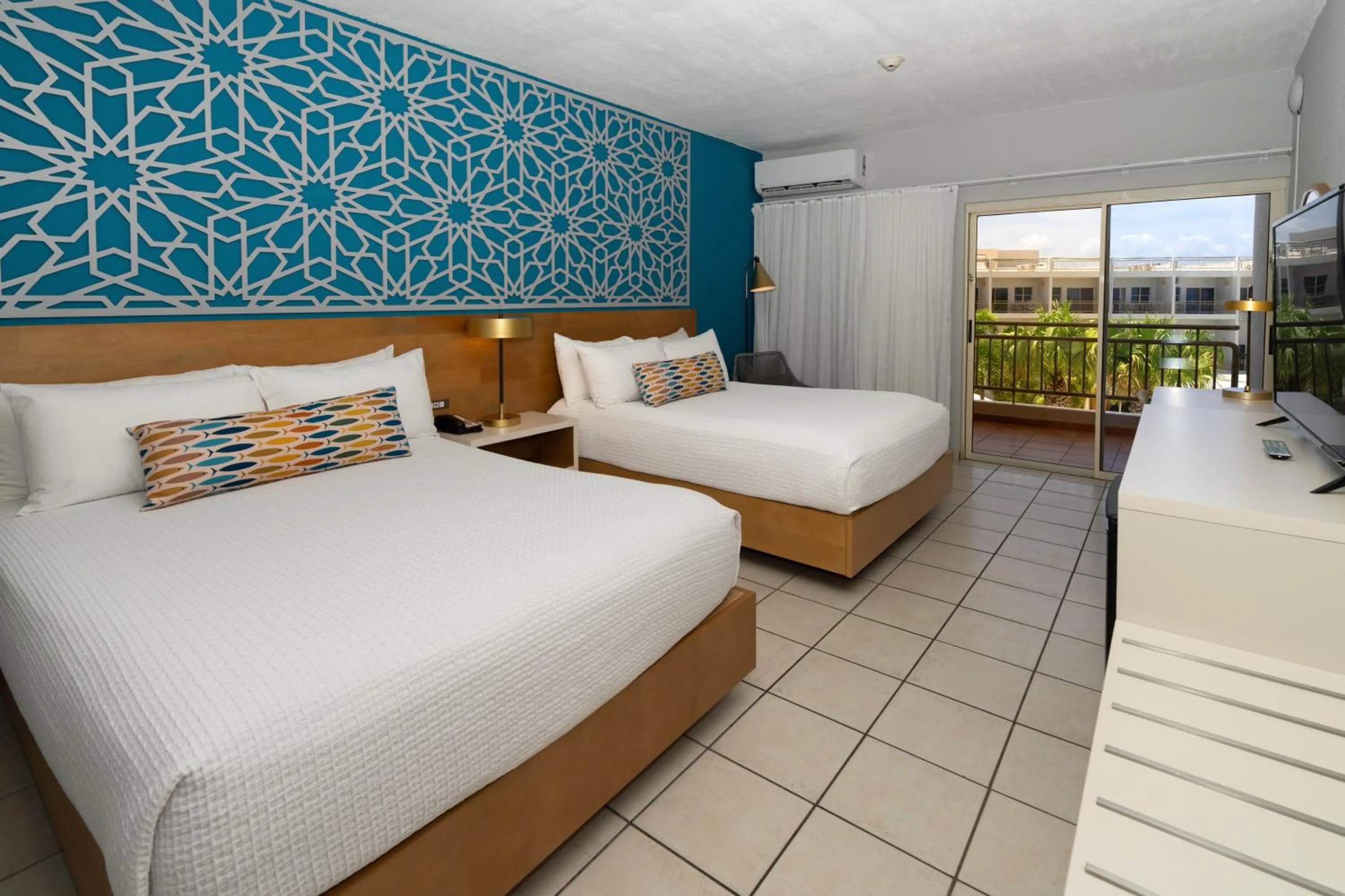 Bed in Rincon of the Seas Grand Caribbean Hotel