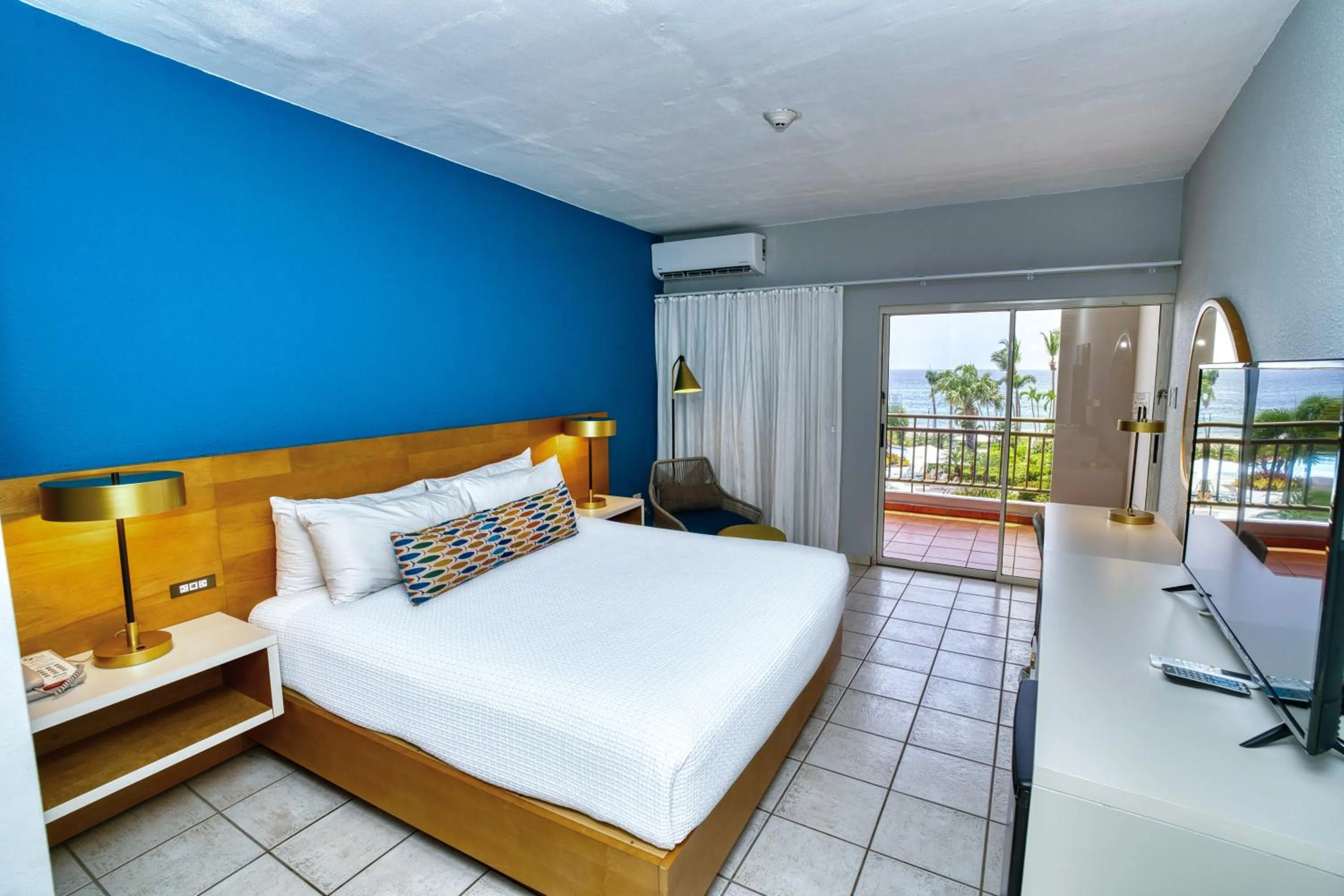 Bed in Rincon of the Seas Grand Caribbean Hotel