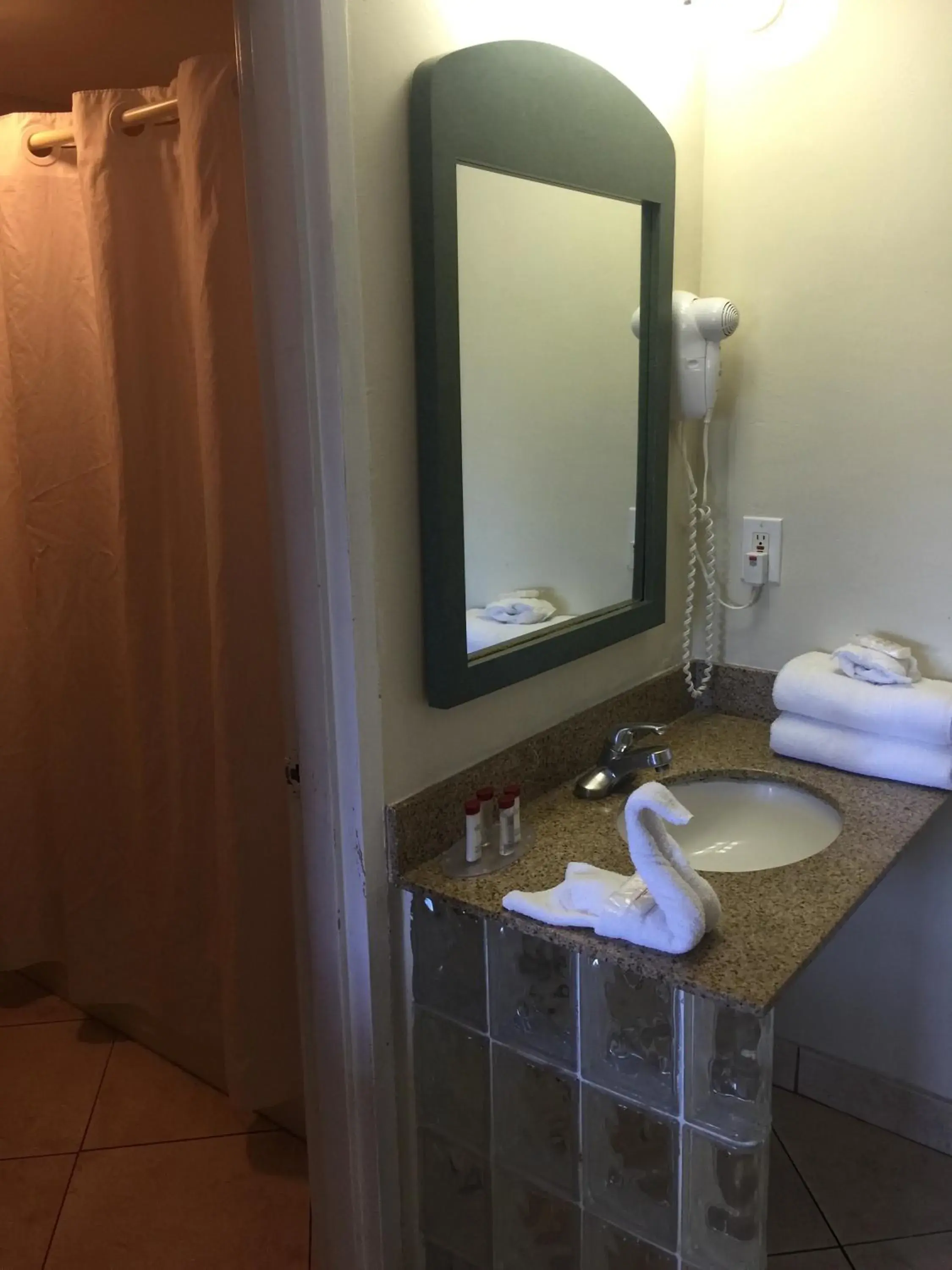 Shower, Bathroom in Curtis Inn & Suites