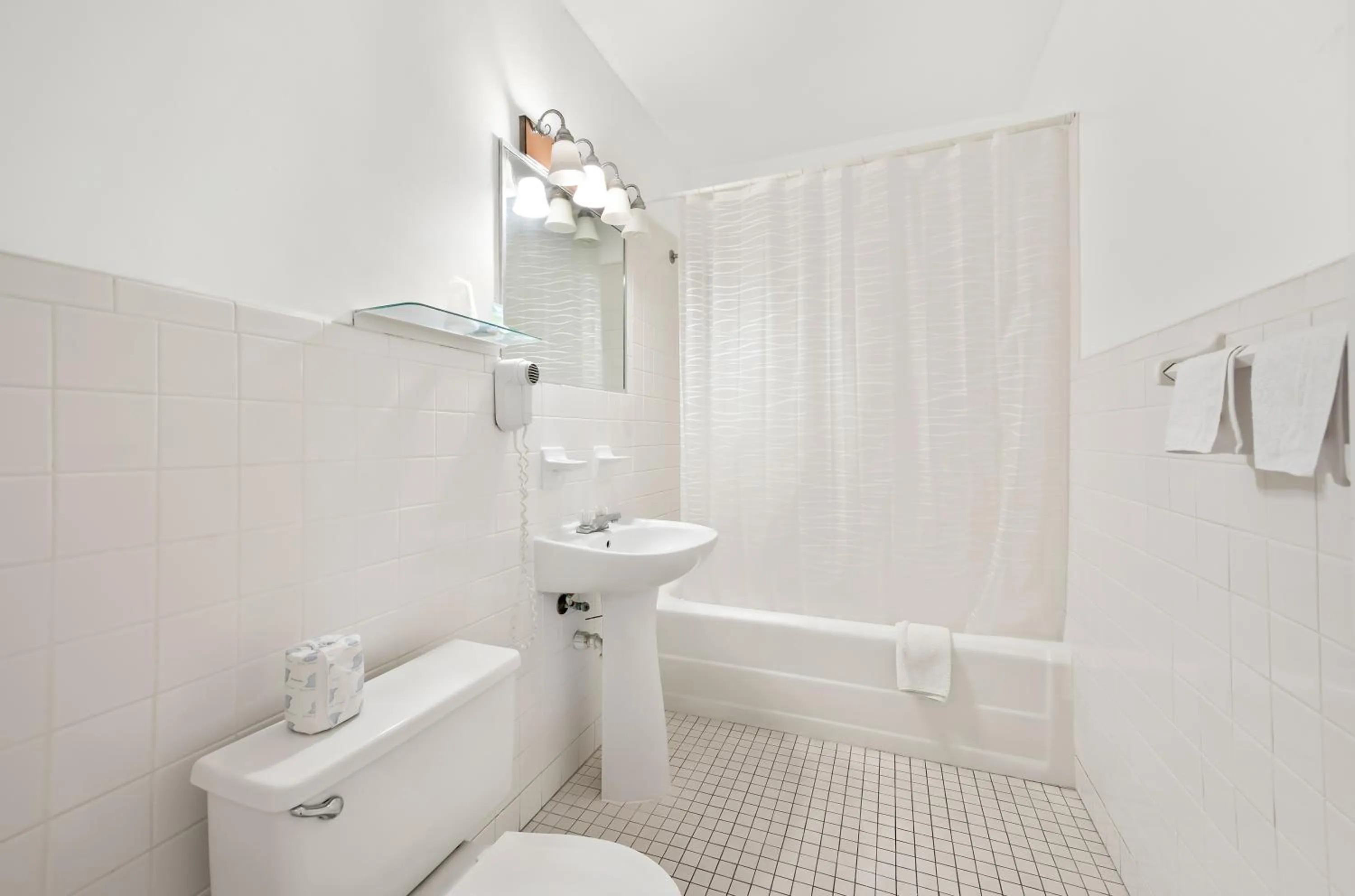 Shower in Americas Best Value Inn Historic Clewiston Inn